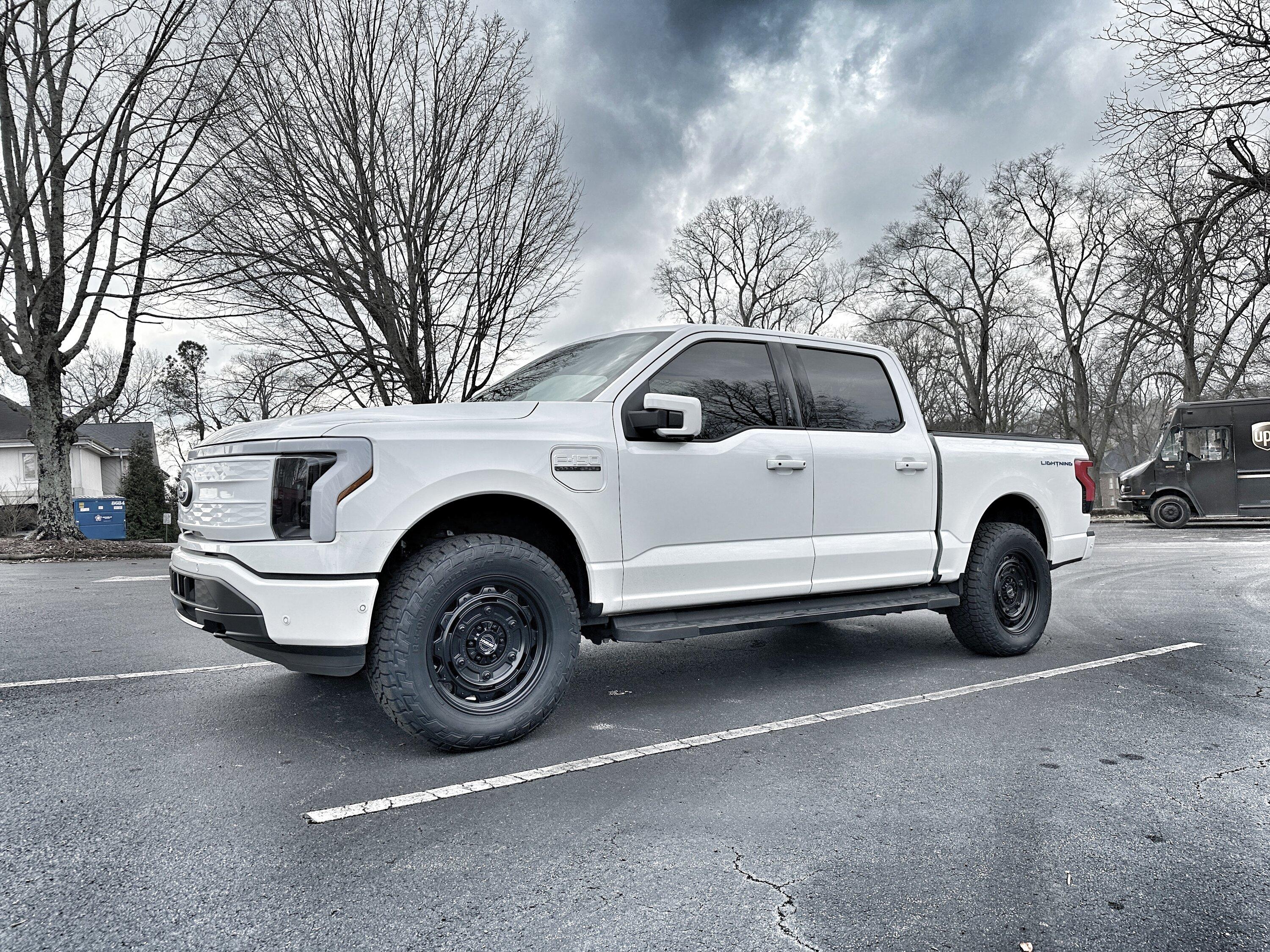 Ford F-150 Lightning Just a little bigger: 2" Readylift Lift Kit, 20" Brink Barracks wheels, Nitto Recon Grappler tires, white grille (Star White Lightning) 040B2937-5339-412F-8B8B-6DF142BFBA31