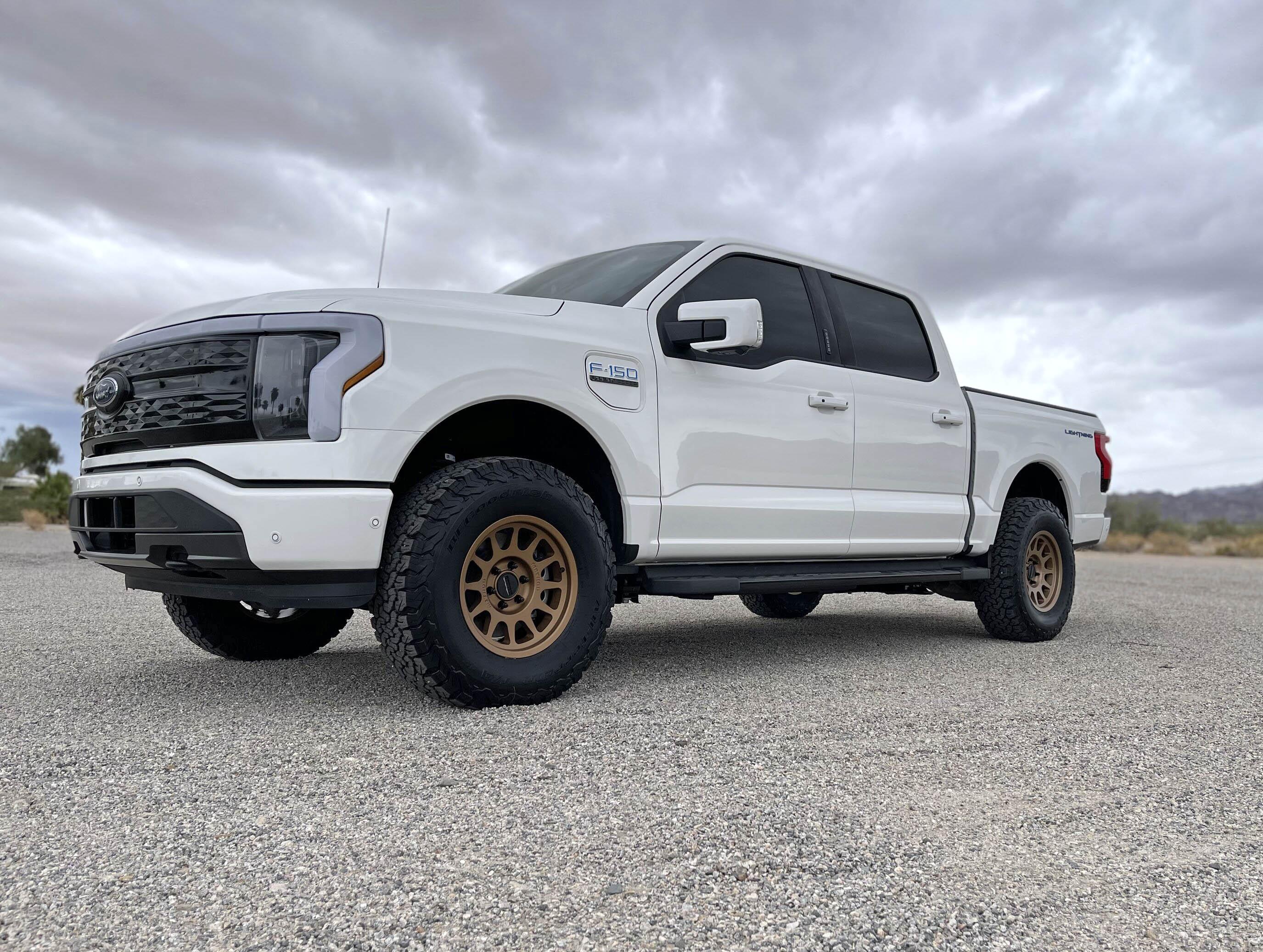 Ford F-150 Lightning Transformation is complete! 17" Method wheels installed + Stage3Motorsports leveling kit on Star White Lightning 068303FB-02CB-4F54-99D7-879A5864F9FB