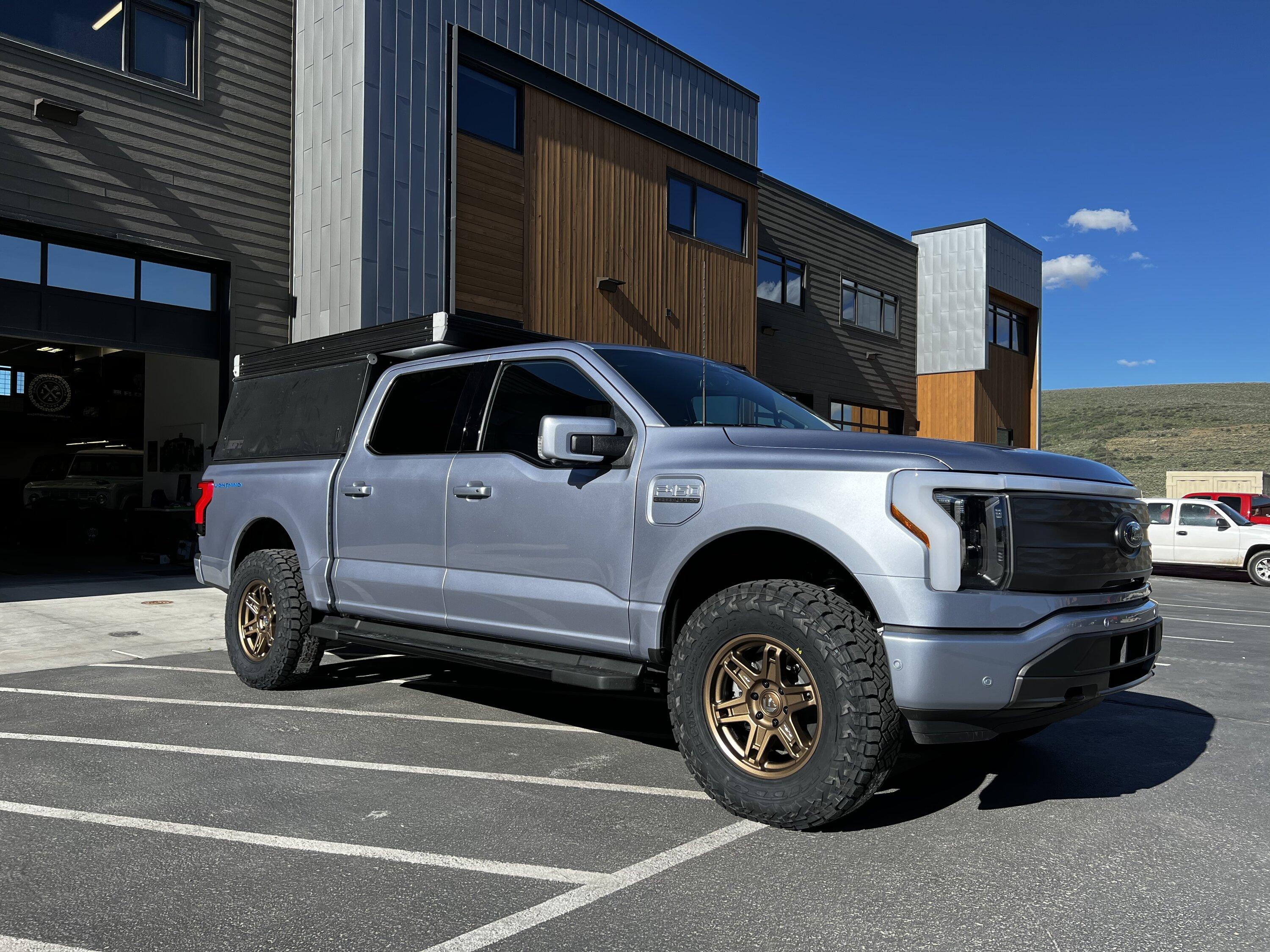 Ford F-150 Lightning Lightning on Fox Shocks, Nitto Recon Grapplers, Fuel Wheels and w/ Go Fast Camper 1656729891750