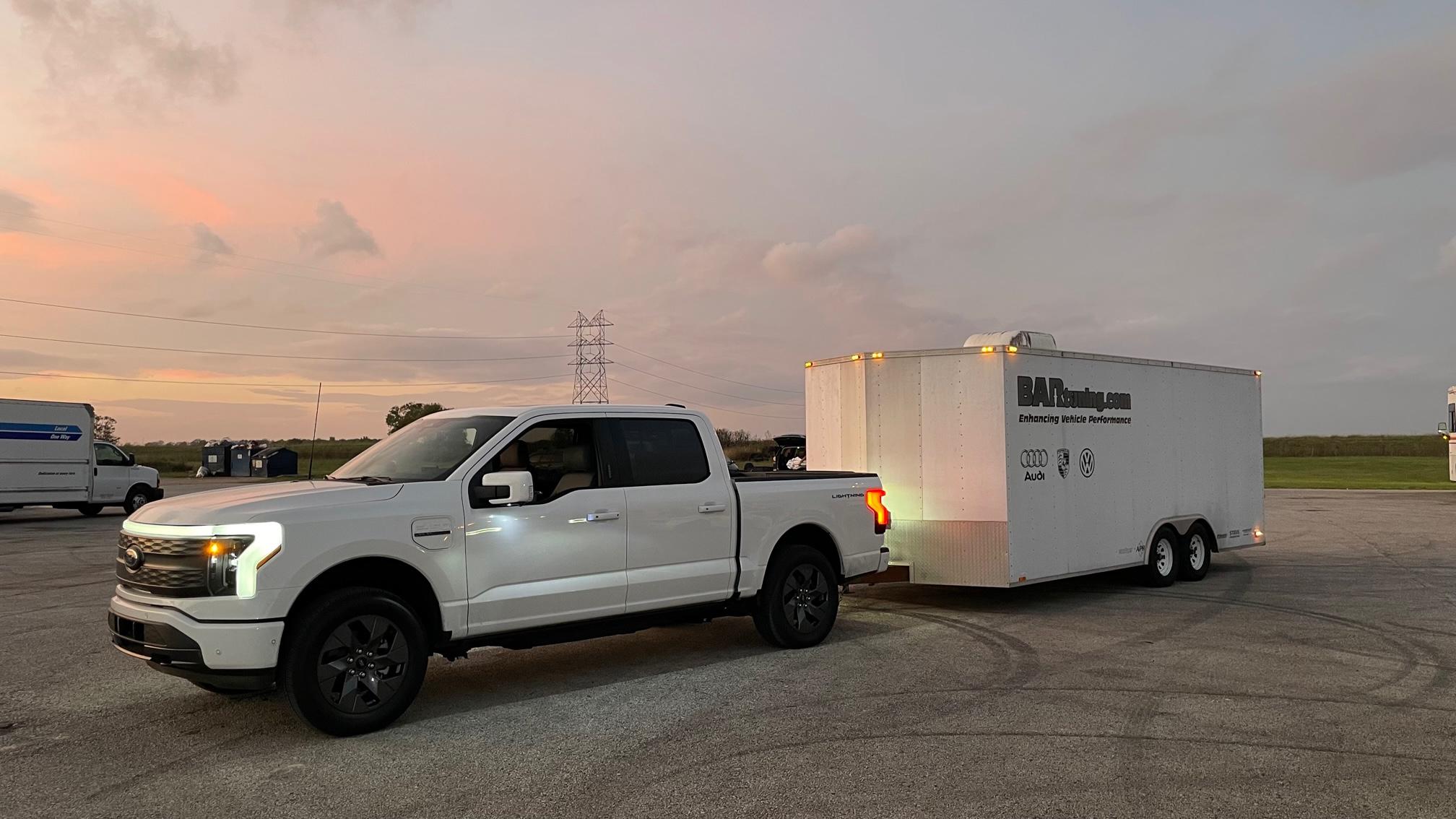 Ford F-150 Lightning First tow with the Lightning -- race car, wheels & tires from the track 1667786528351