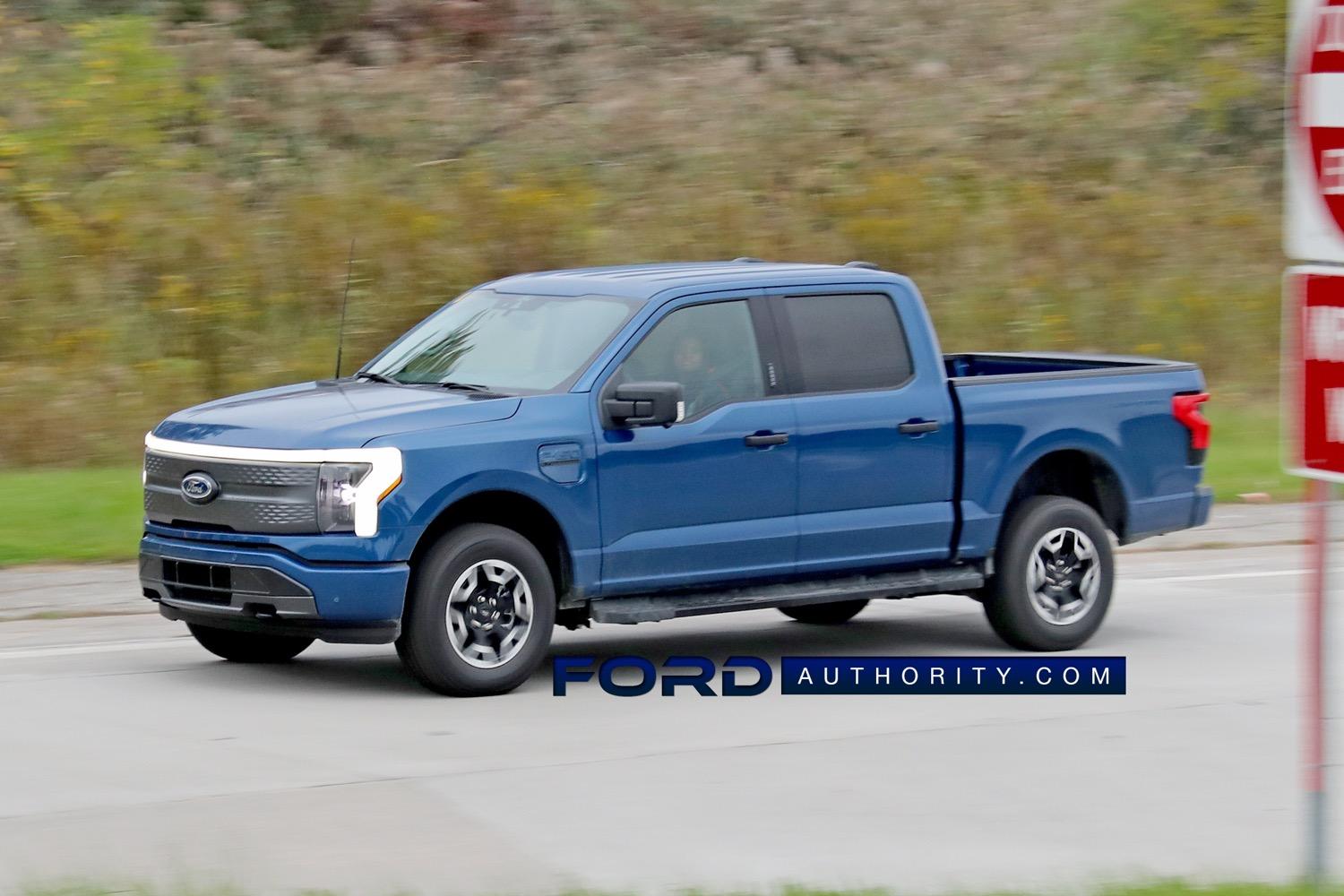 Ford F-150 Lightning ATLAS BLUE F-150 Lightning Photos & Club 2022-F-150-Lightning-XLT-in-Atlas-Blue-On-The-Road-Photos-November-2021-Exterior-003