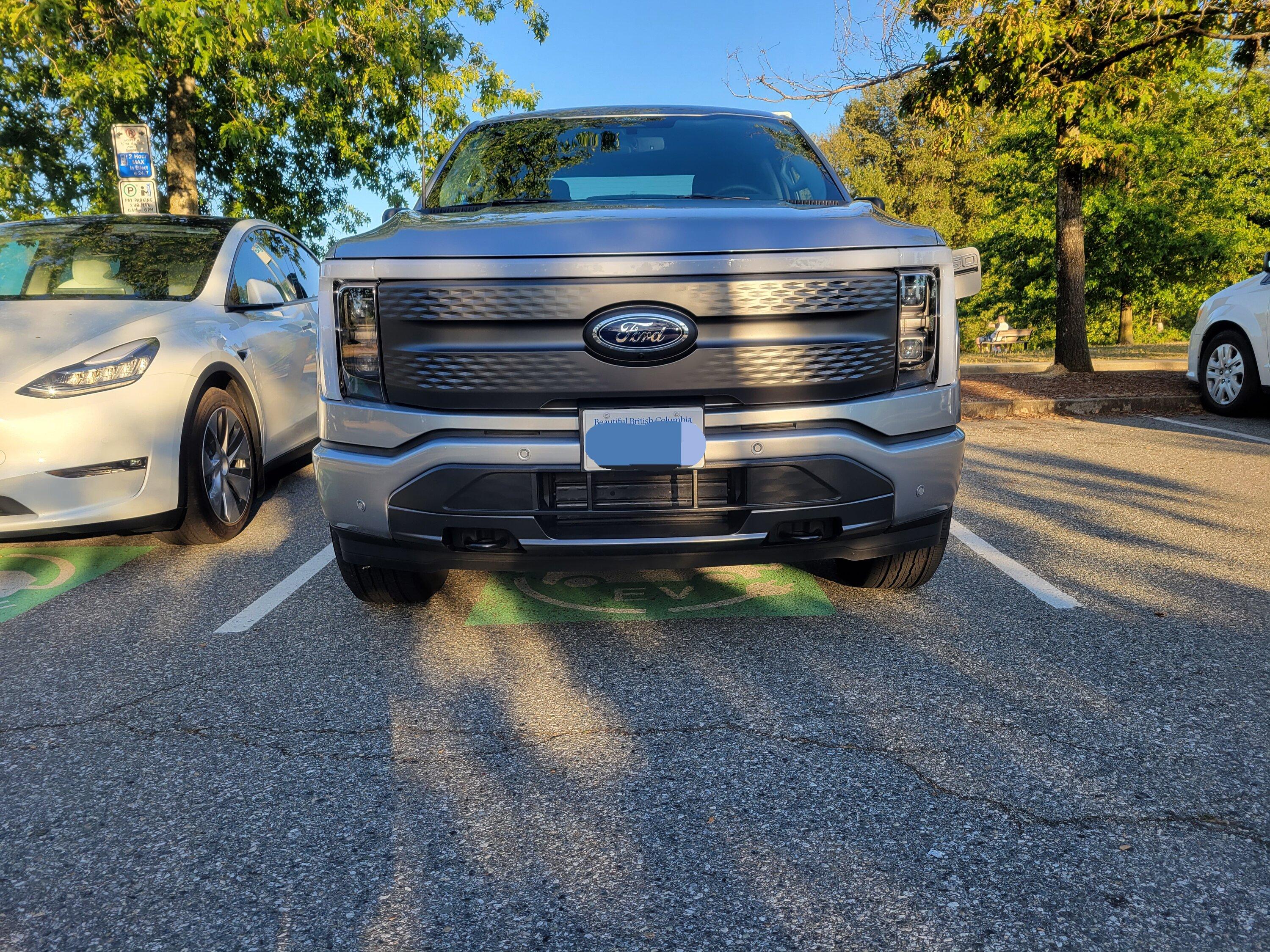 Ford F-150 Lightning Geez, I thought these things were rare. Apparently not 20220828_185316