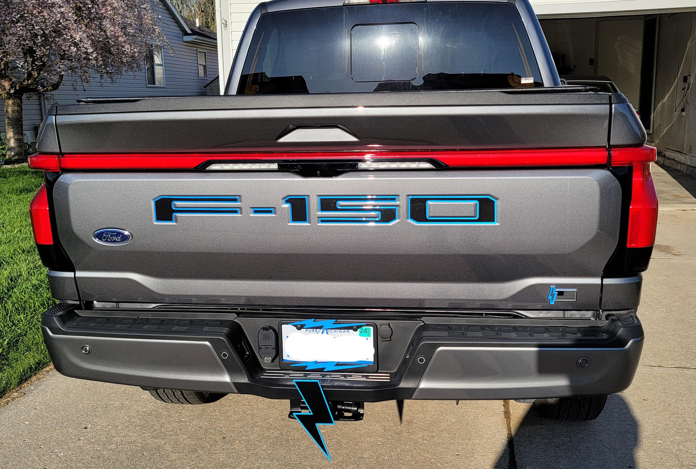 Ford F-150 Lightning Raised reflective letters installed on tailgate and charge door 20230427_184232