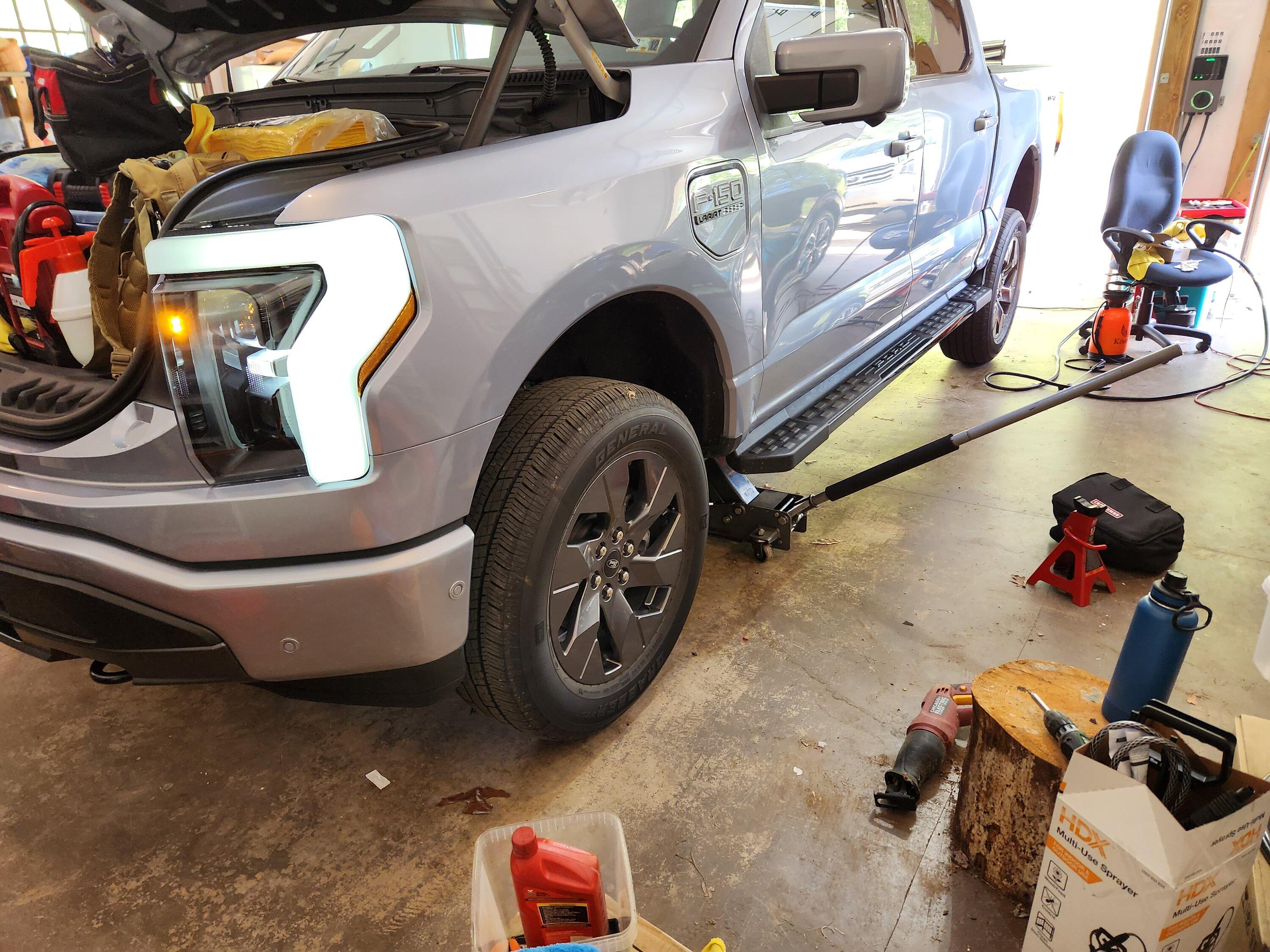 Ford F-150 Lightning How-to DIY: Home Tire Rotation without removing underbody plastic panel shielding 20230513_184053