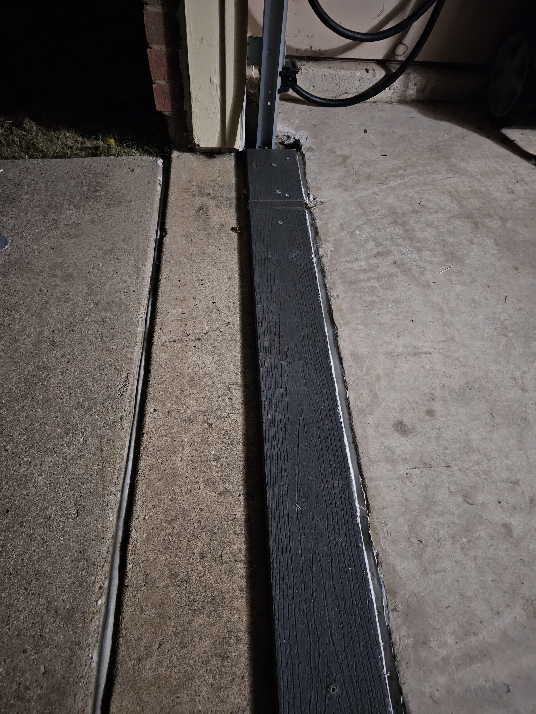 Ford F-150 Lightning Charging under the garage door, what do you use to protect the cable 20231003_051318