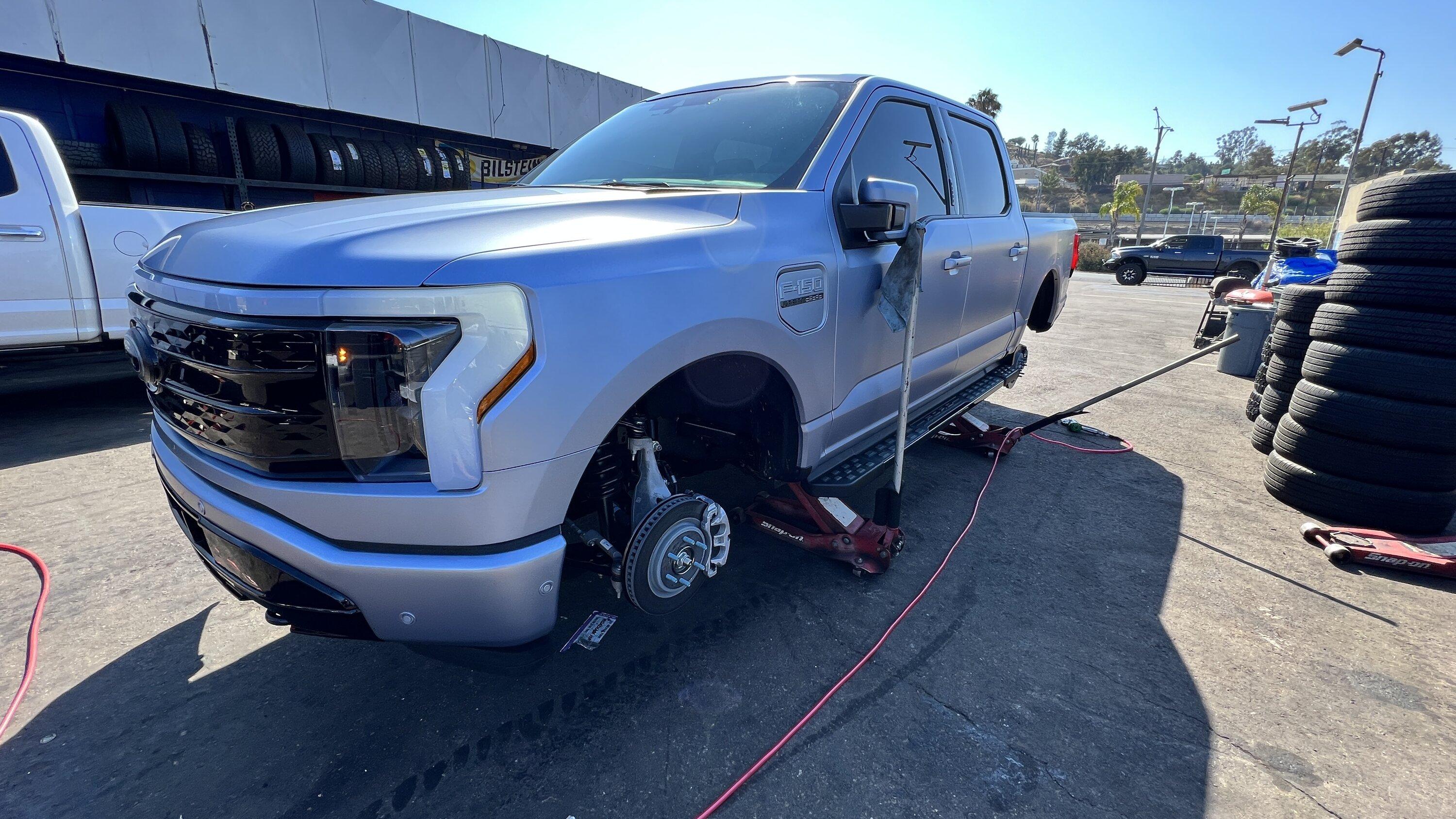 Ford F-150 Lightning Iced Blue Silver Lightning Build. Mods: PPF matte finish, Line-X, gloss black painted grille, black wrapped roof, wheels 20EAB787-B1DF-4475-8986-F5E2BEBD296C