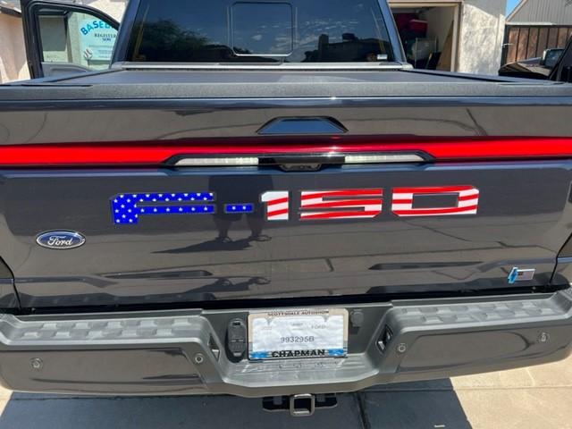 Ford F-150 Lightning Raised reflective letters installed on tailgate and charge door 3