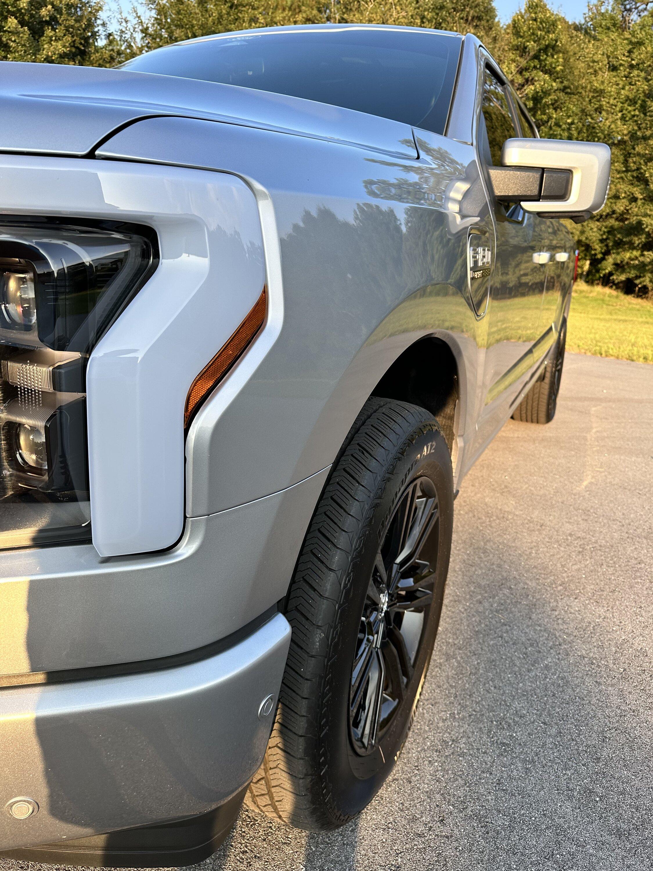 Ford F-150 Lightning Gloss black 20" wheels on my Lightning Lariat with stock AT tires, tints, AMP Power Steps 45A2BD59-91CA-441D-89AC-BE3FC7102783