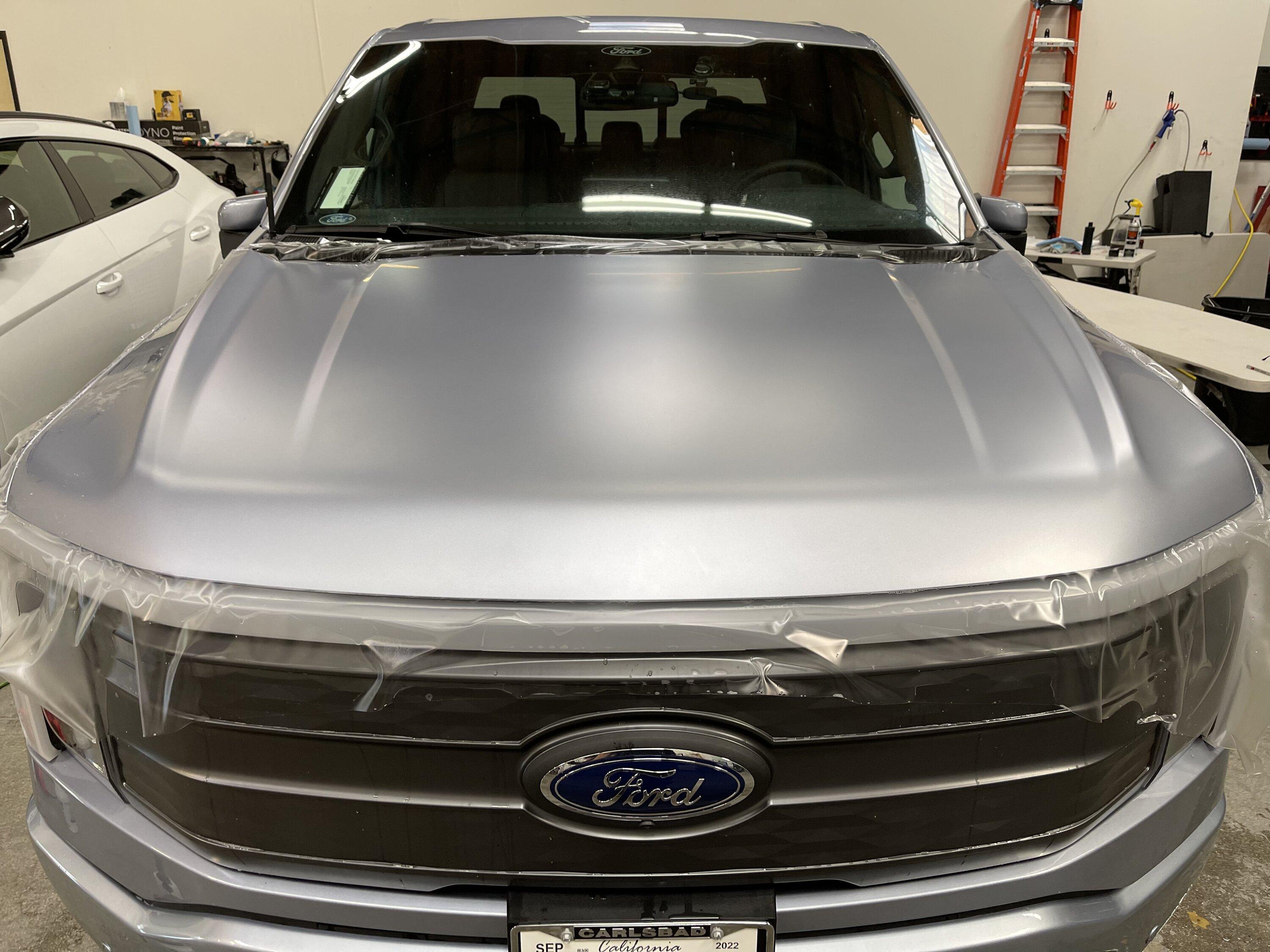 Ford F-150 Lightning Iced Blue Silver Lightning Build. Mods: PPF matte finish, Line-X, gloss black painted grille, black wrapped roof, wheels 4E0D9512-6027-4930-8614-A0F8F943218F
