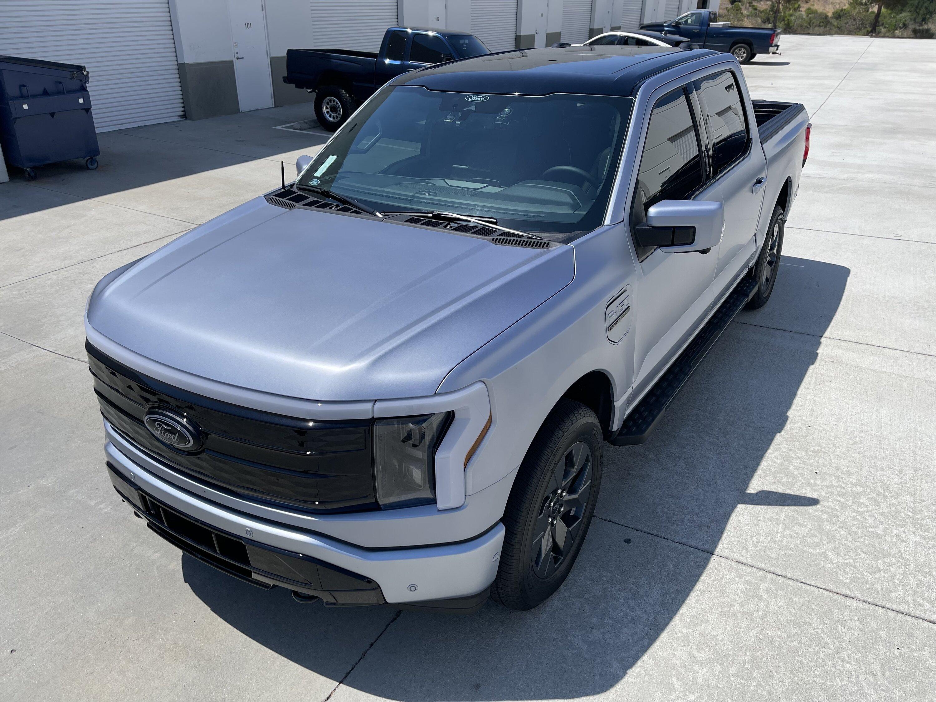 Ford F-150 Lightning Iced Blue Silver Lightning Build. Mods: PPF matte finish, Line-X, gloss black painted grille, black wrapped roof, wheels 62361D06-83FD-40AE-88AA-0BE4604B7E64