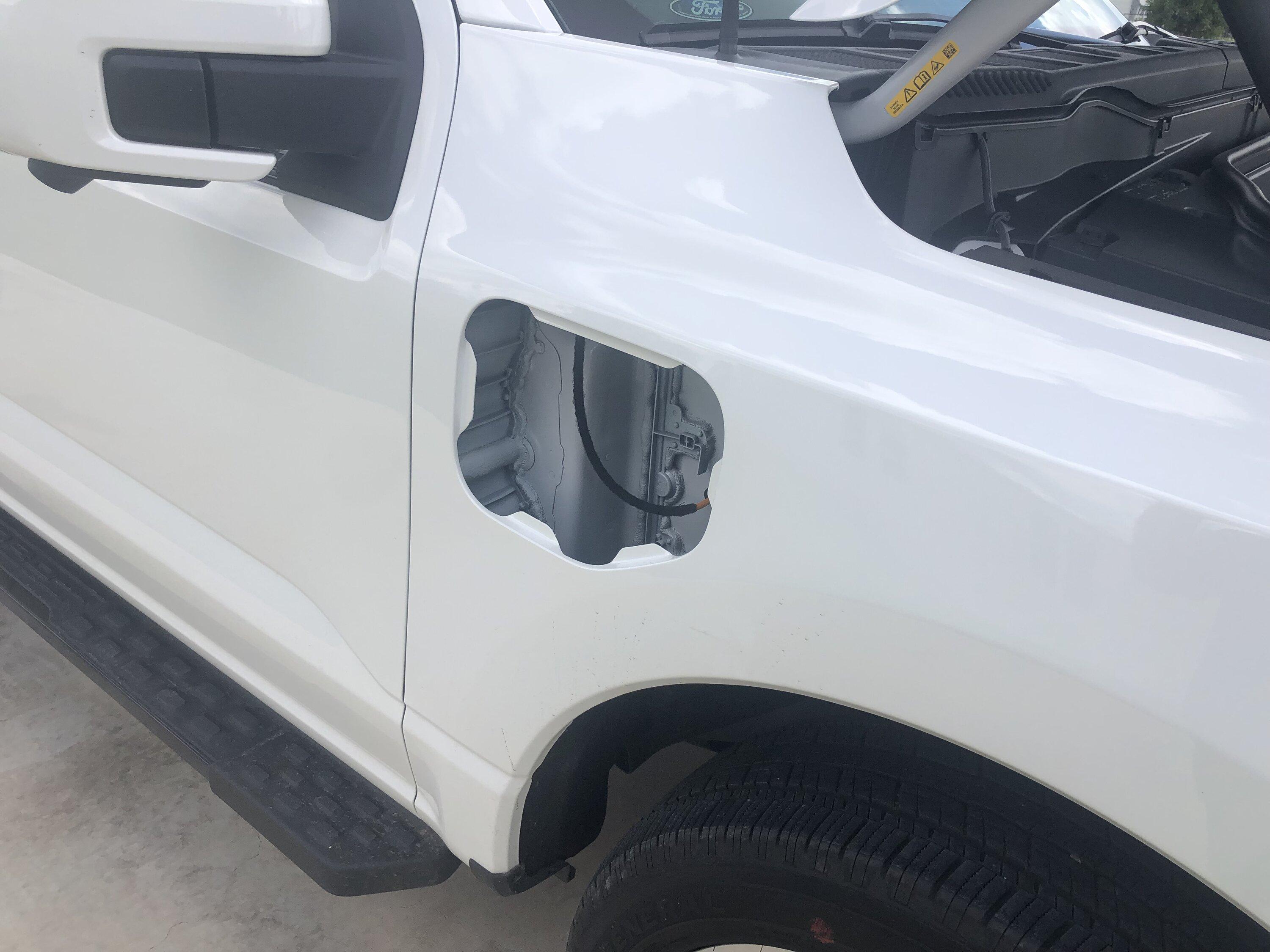 Ford F-150 Lightning Passenger side hinged faux charging port cover.   Anyone making one? 64D4FDD6-A0E9-44FA-B05F-2D648B38B10D