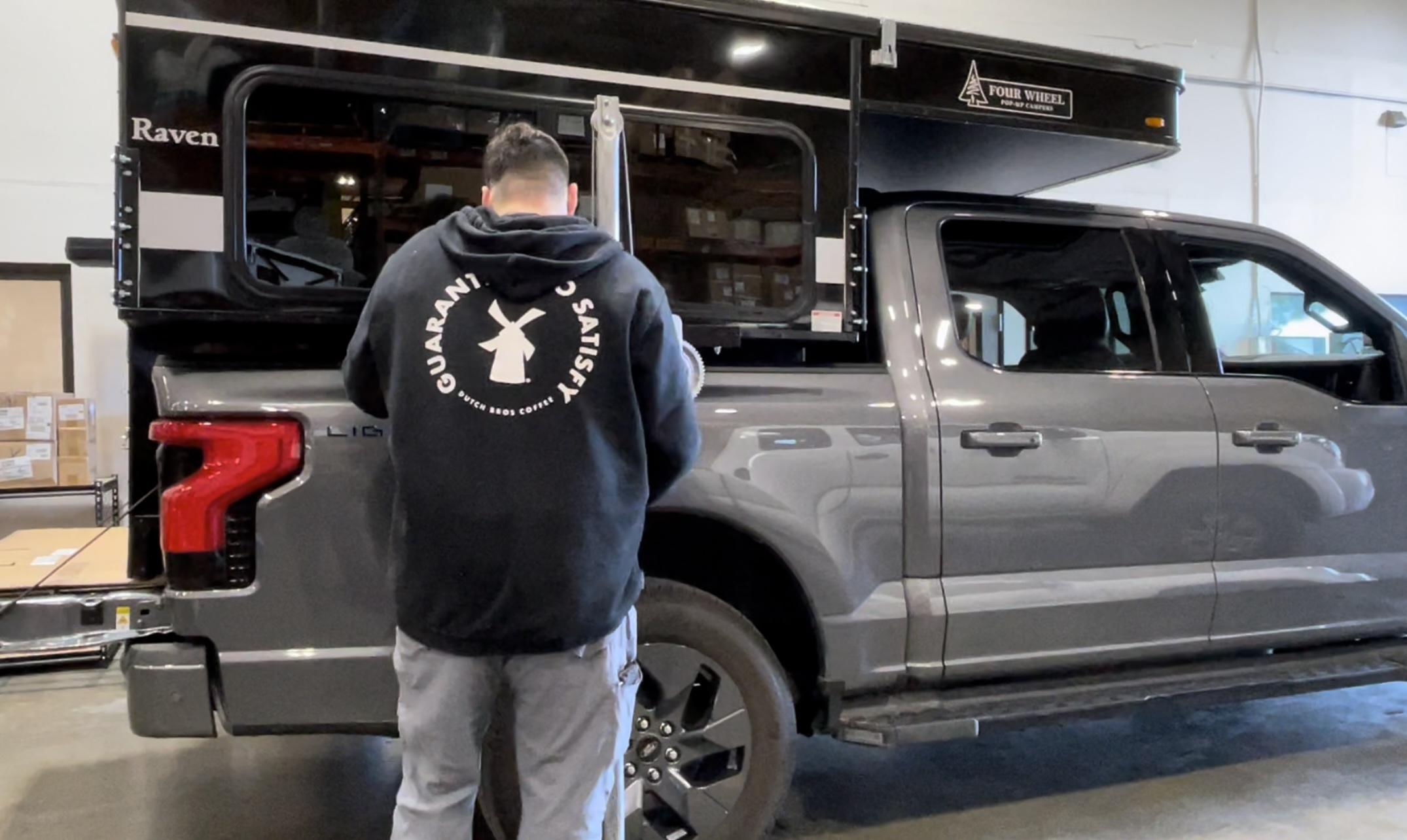 Ford F-150 Lightning Slide in Pop-up Camper by Four Wheel Campers being assessed for Lightning 76DBD806-2DCB-46C4-A940-7198852D4C0C