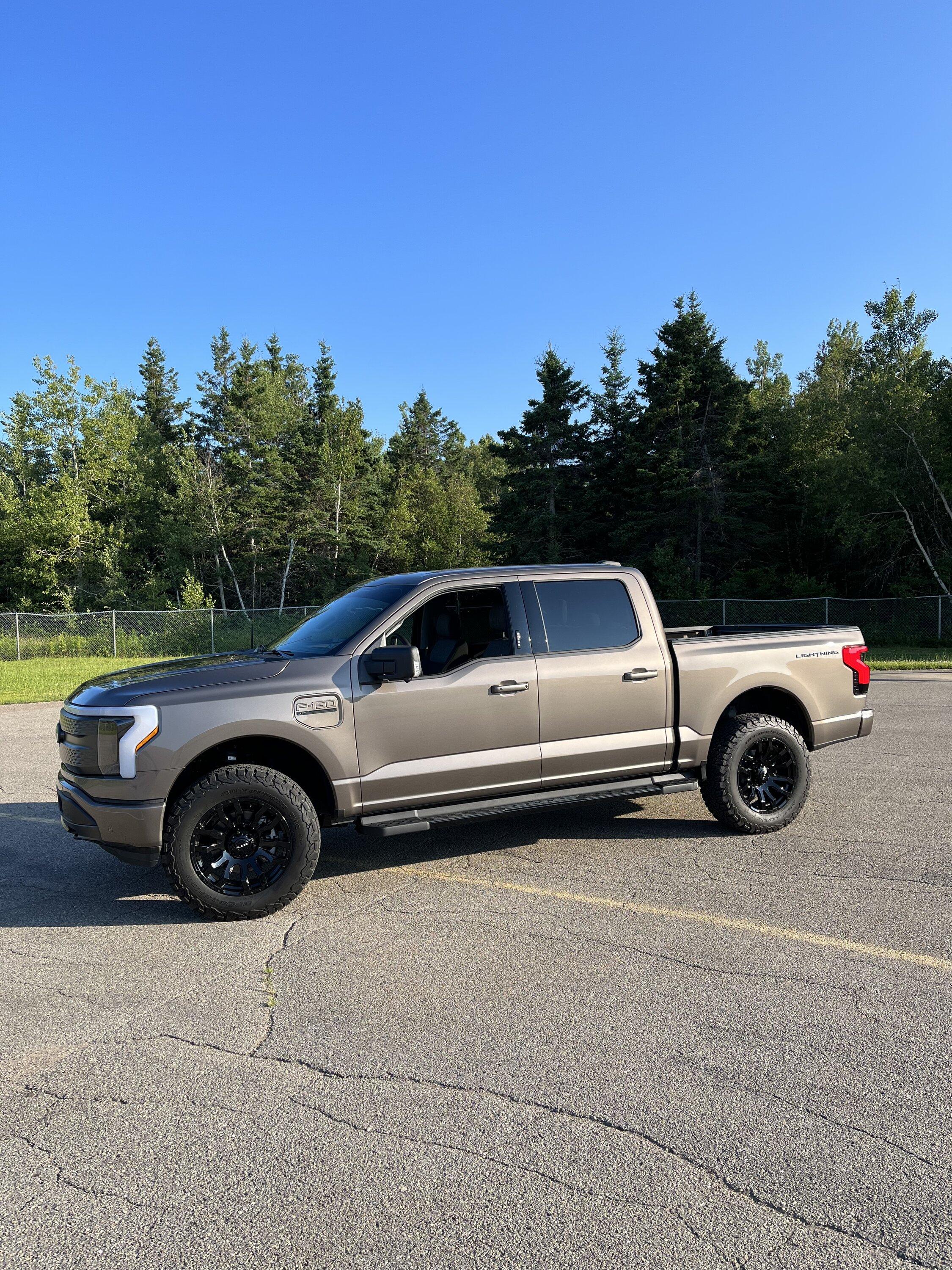 Ford F-150 Lightning My Stone Gray XLT Lightning on 2" Rough Country leveling kit, 20" RTX Patton wheels, 285/65/R20 BFG KO2 907A55A4-349D-4F46-A5CF-B5753EC6108F