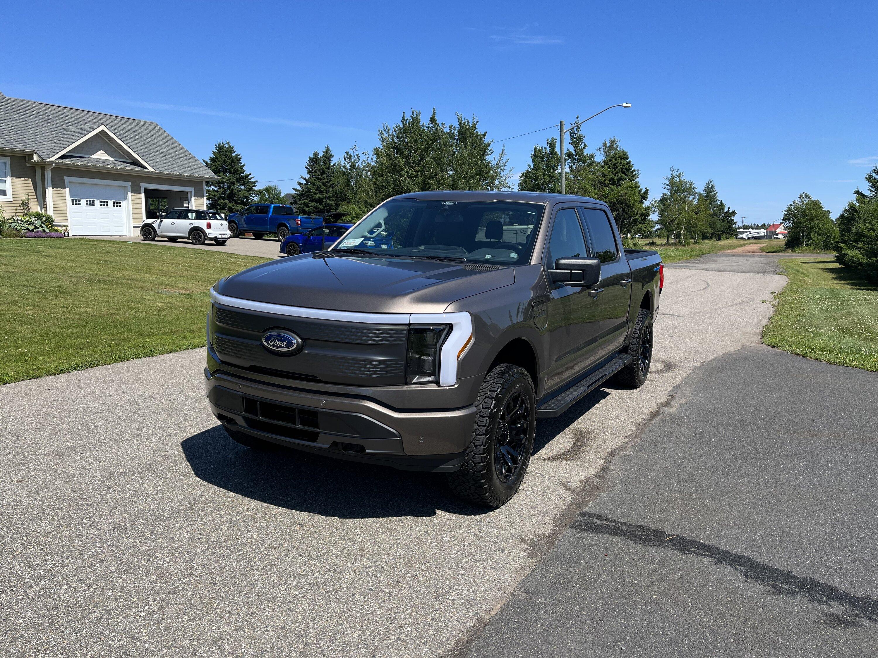 Ford F-150 Lightning My Stone Gray XLT Lightning on 2" Rough Country leveling kit, 20" RTX Patton wheels, 285/65/R20 BFG KO2 90A6E436-1DF3-470D-AD2A-BDCCF9974EF4