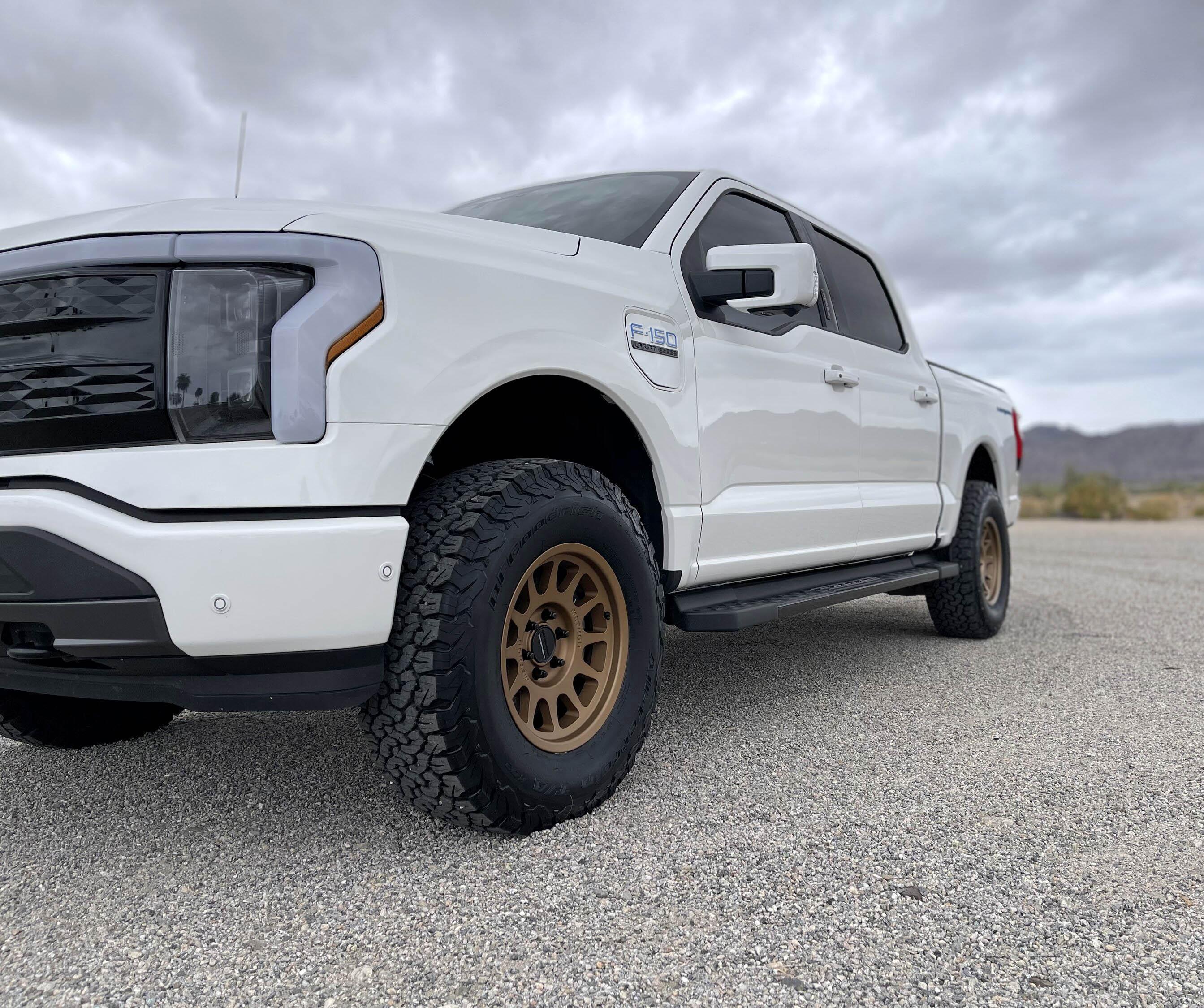 Ford F-150 Lightning Transformation is complete! 17" Method wheels installed + Stage3Motorsports leveling kit on Star White Lightning 9ABB225A-E644-4AA4-9090-A47355D7CADB