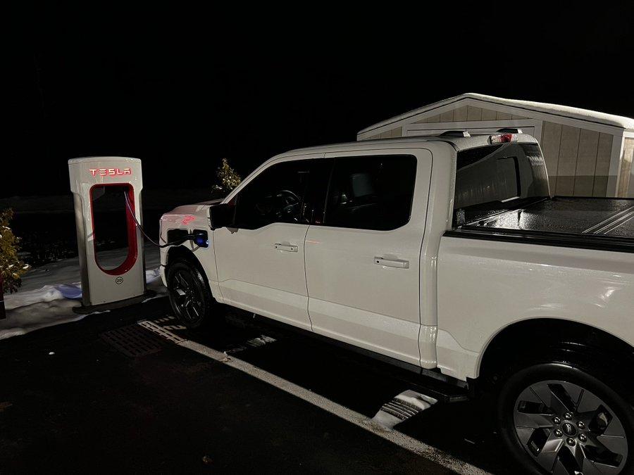 Ford F-150 Lightning First Tesla Supercharger with ‘Magic Dock’ CCS Adapter for non-Tesla electric cars spotted in the US. Charges up a Rivian 9D88CEEE-31CA-4ABD-821E-D78FC7394208