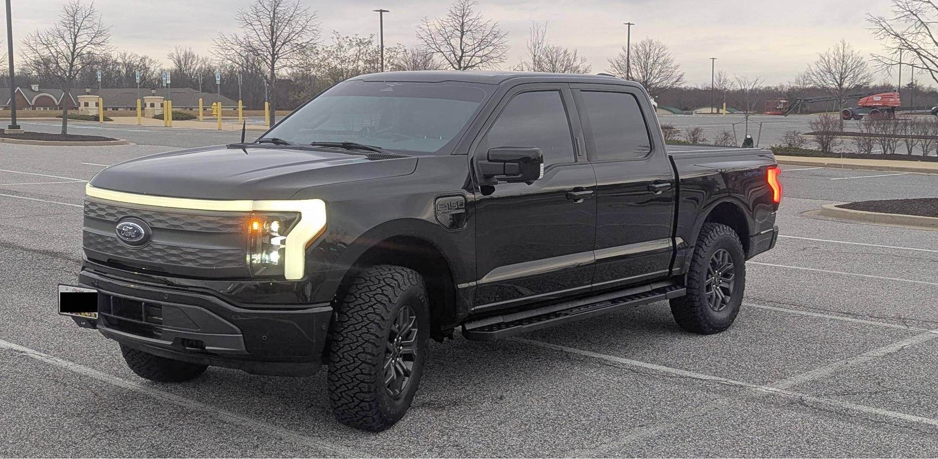 Ford F-150 Lightning Tremor wheels with KO3 tires + Eibach level kit installed After Front.JPG
