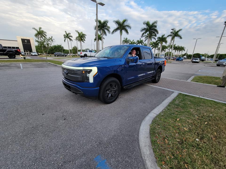 Ford F-150 Lightning [Correction] Atlas Blue F-150 Lightning preproduction at dealer Antimatter Blue Metallic Mannequin demo F-150 Lightning now arriving at dealers 2