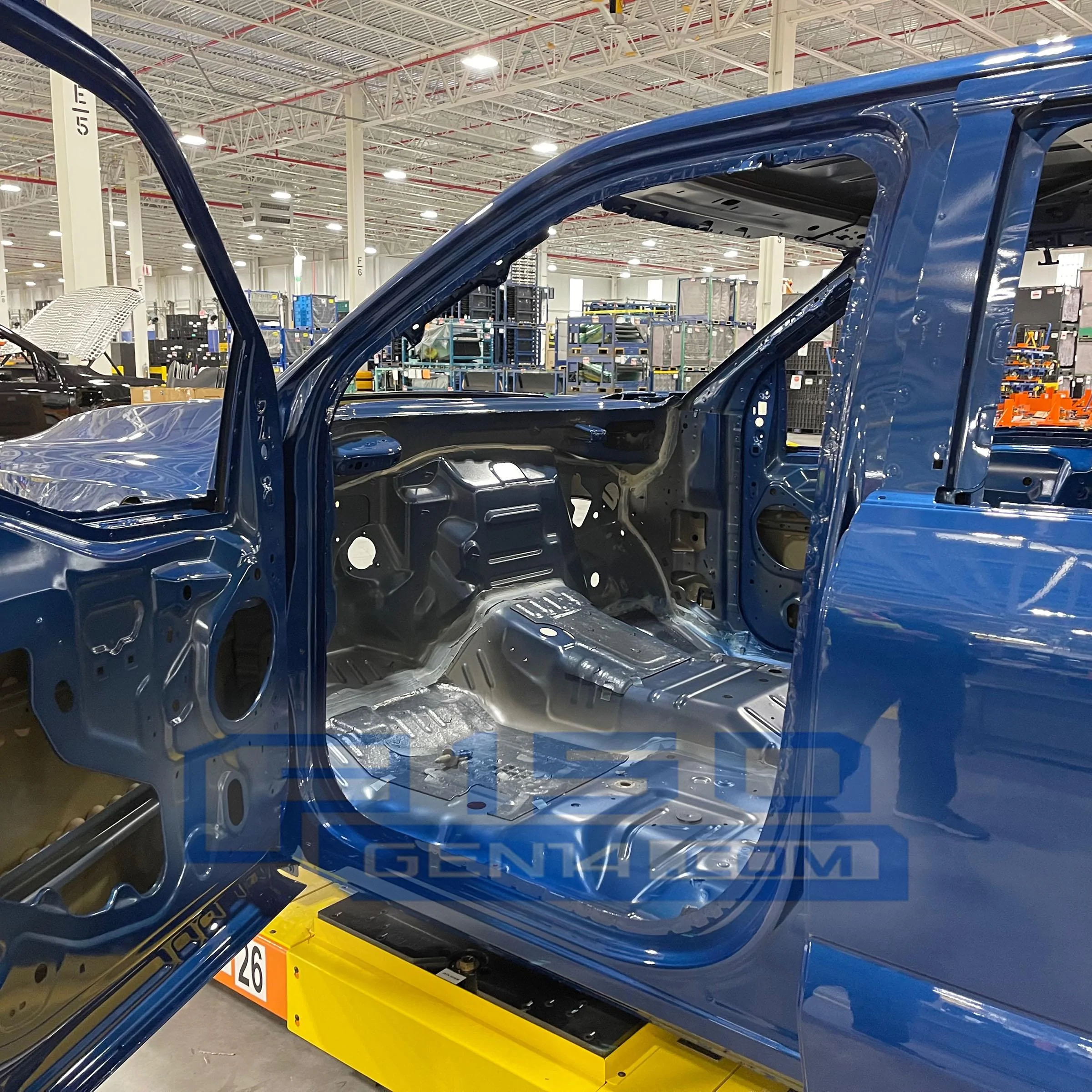 Ford F-150 Lightning Inside Rouge Factory: Atlas Blue, Stone Gray, Oxford White F-150 Lightning + bonus Iced Blue Silver pics Atlas Blue F-150 Lightning production line rouge factory