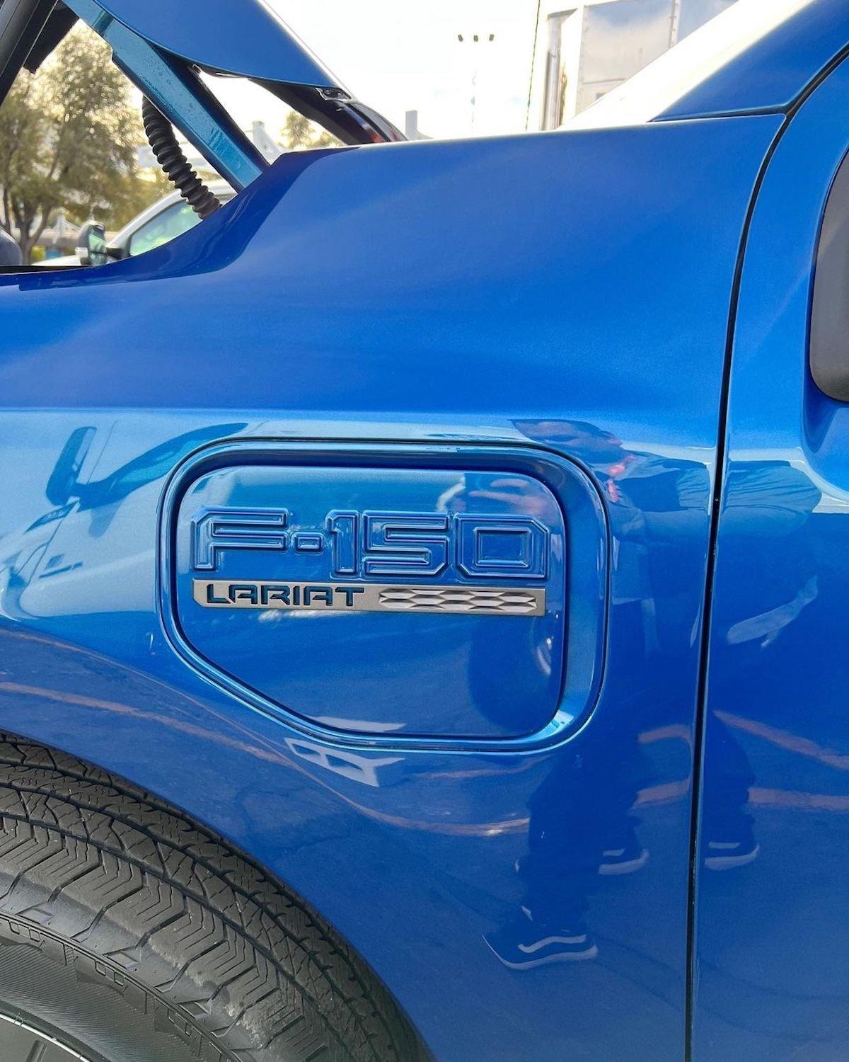 Ford F-150 Lightning Lightning Lariat in Atlas Blue Being Exhibited at World of Concrete Show in Las Vegas Atlas Blue F150 Lightning Lariat EV Pickup World of Concrete 1