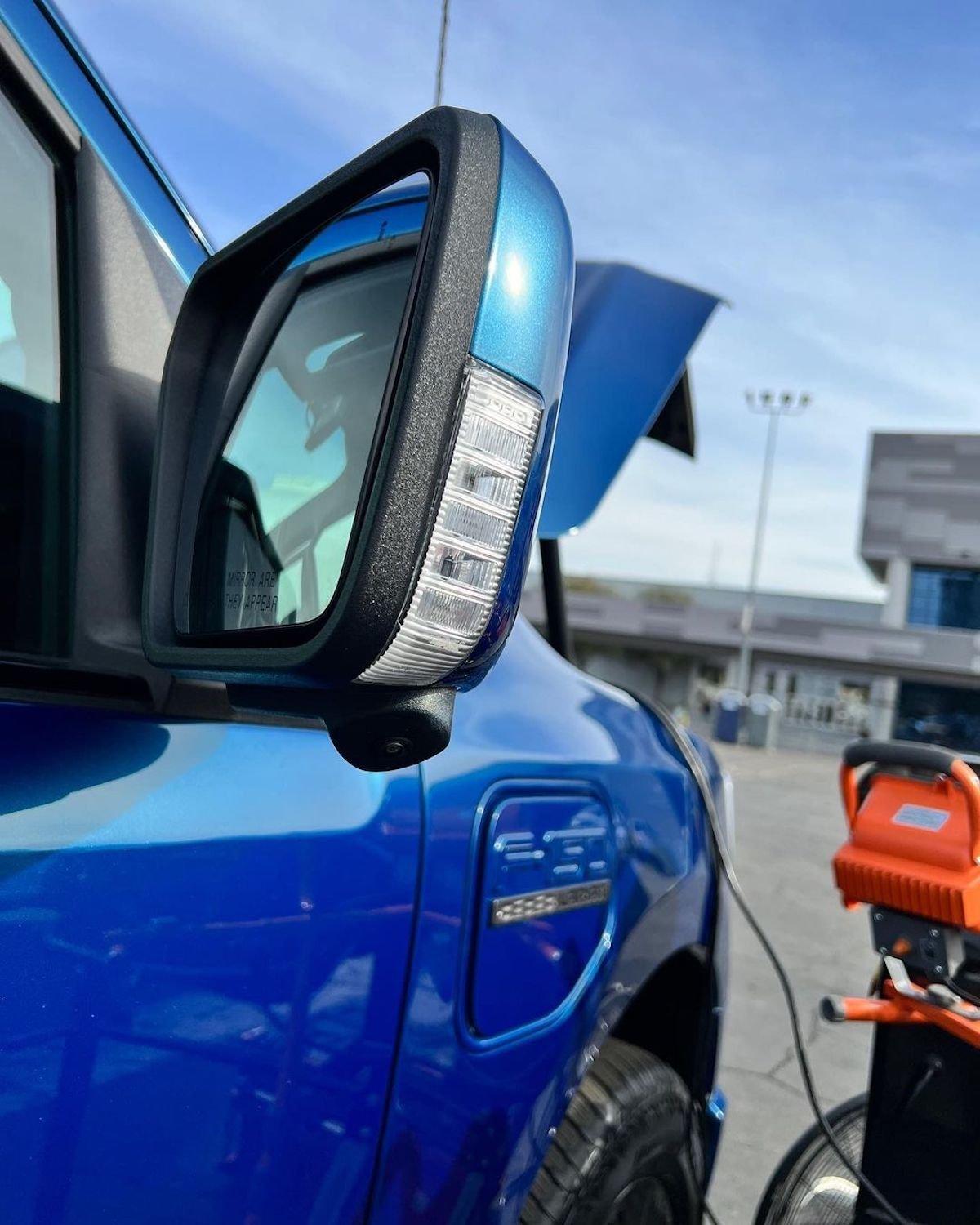 Ford F-150 Lightning Lightning Lariat in Atlas Blue Being Exhibited at World of Concrete Show in Las Vegas Atlas Blue F150 Lightning Lariat EV Pickup World of Concrete 8