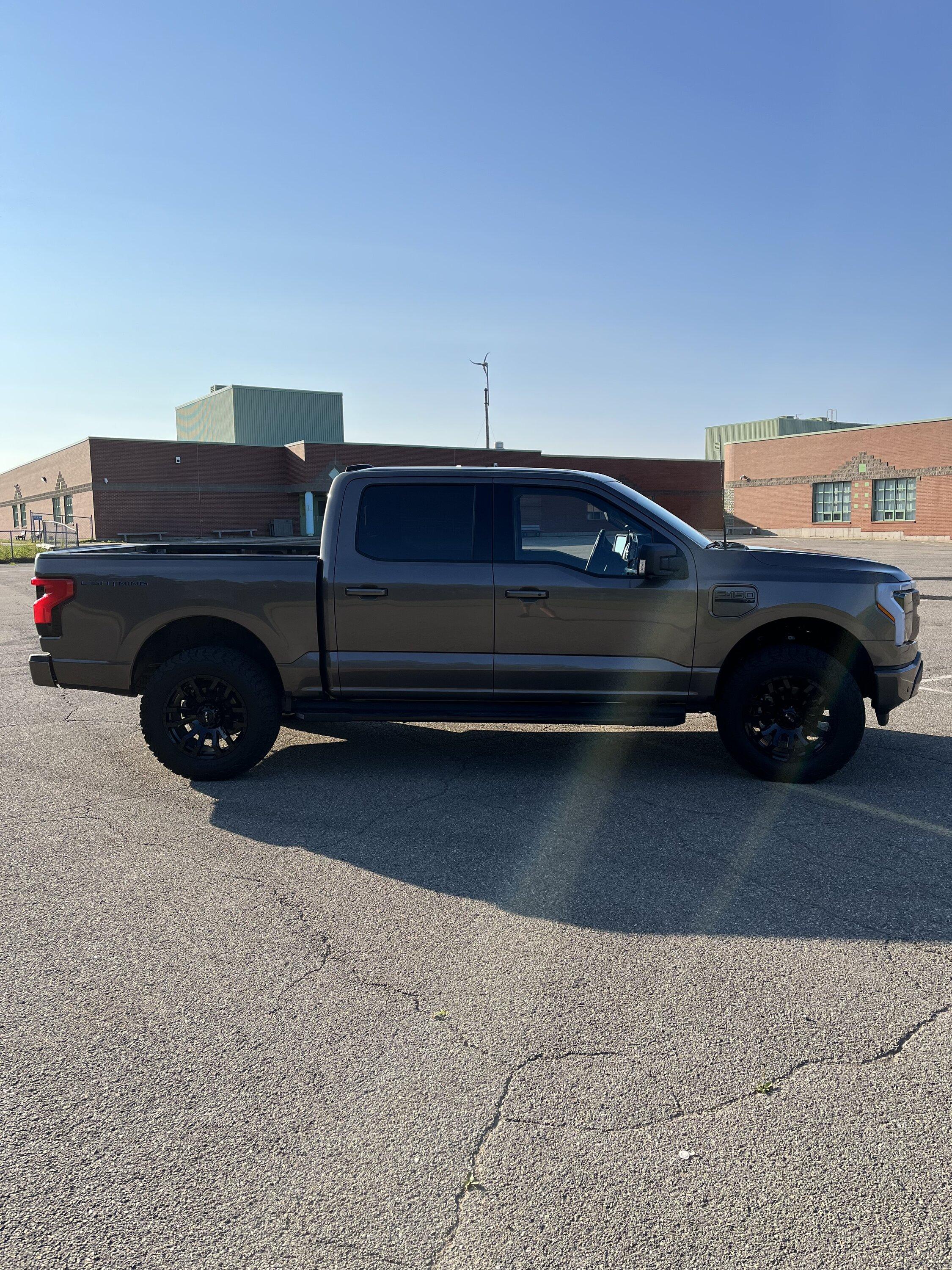 Ford F-150 Lightning My Stone Gray XLT Lightning on 2" Rough Country leveling kit, 20" RTX Patton wheels, 285/65/R20 BFG KO2 C316E1F3-31BB-470A-9A9A-752B9BE41FD2