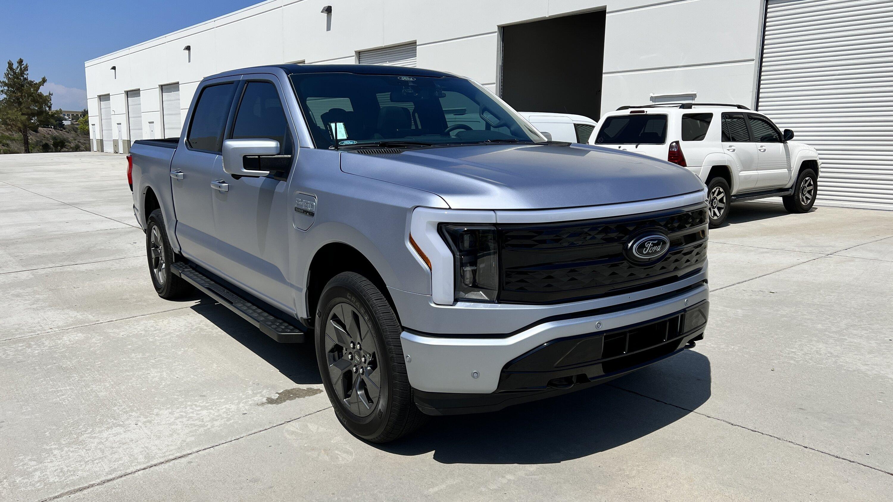 Ford F-150 Lightning Iced Blue Silver Lightning Build. Mods: PPF matte finish, Line-X, gloss black painted grille, black wrapped roof, wheels d3092faa-c361-438f-bd28-99c9cbf5c2ad-jpe