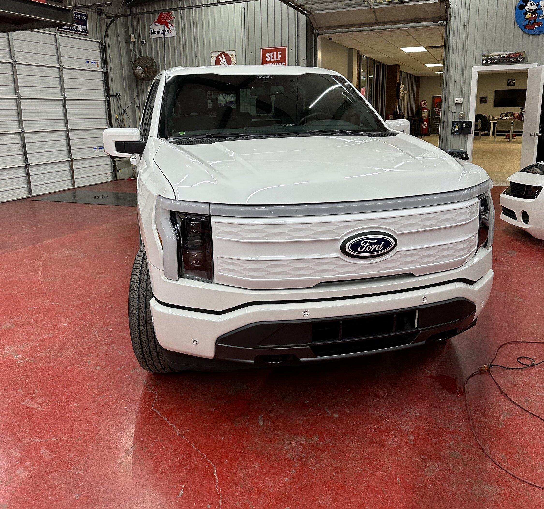 Ford F-150 Lightning Just a little bigger: 2" Readylift Lift Kit, 20" Brink Barracks wheels, Nitto Recon Grappler tires, white grille (Star White Lightning) D7042E5F-ACB1-49F7-BC98-C19881F67FE3