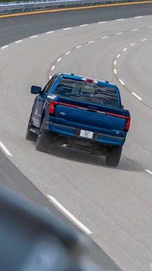 Ford F-150 Lightning Ford F-150 Lightning Will Be 1st All-Electric Pickup Truck To Offer Full-Size Spare Tire e5b296bc-0f04-49ae-a3bd-a4f9b42233b7-light1