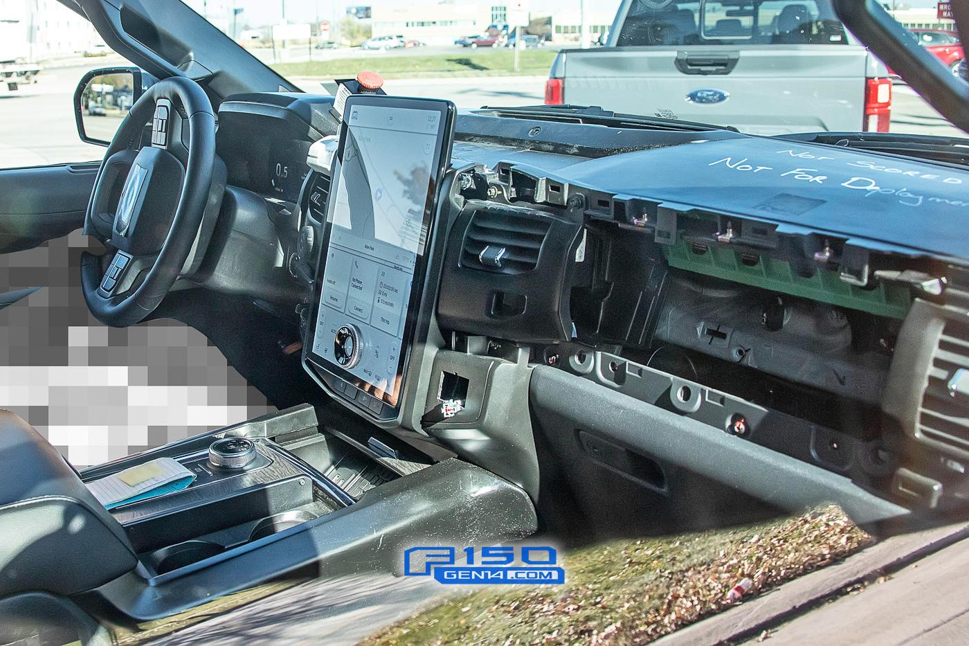 Ford F-150 Lightning Electric F-150 Prototype Caught With Large Mach-E-Style Infotainment Screen ev-f150-electric-mache-large-infotainment-screen-4