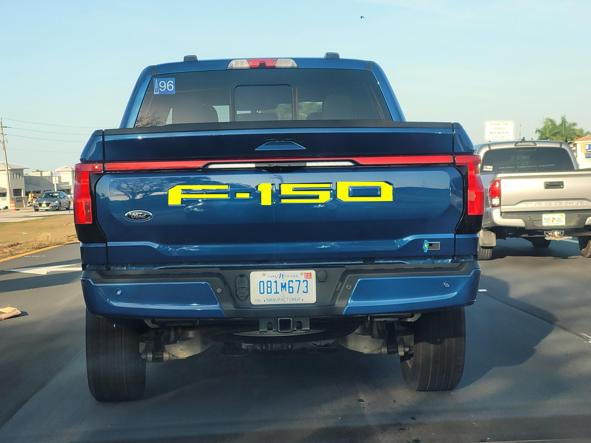 Ford F-150 Lightning My solution to dark badges / lettering on dark colors -- contrasting color vinyl F-150 Lightning Back of Truck