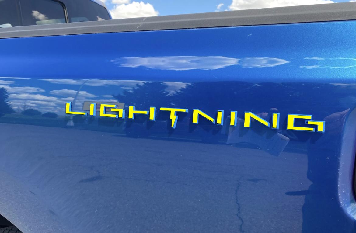 Ford F-150 Lightning My solution to dark badges / lettering on dark colors -- contrasting color vinyl F-150 Lightning Rear Badge 2