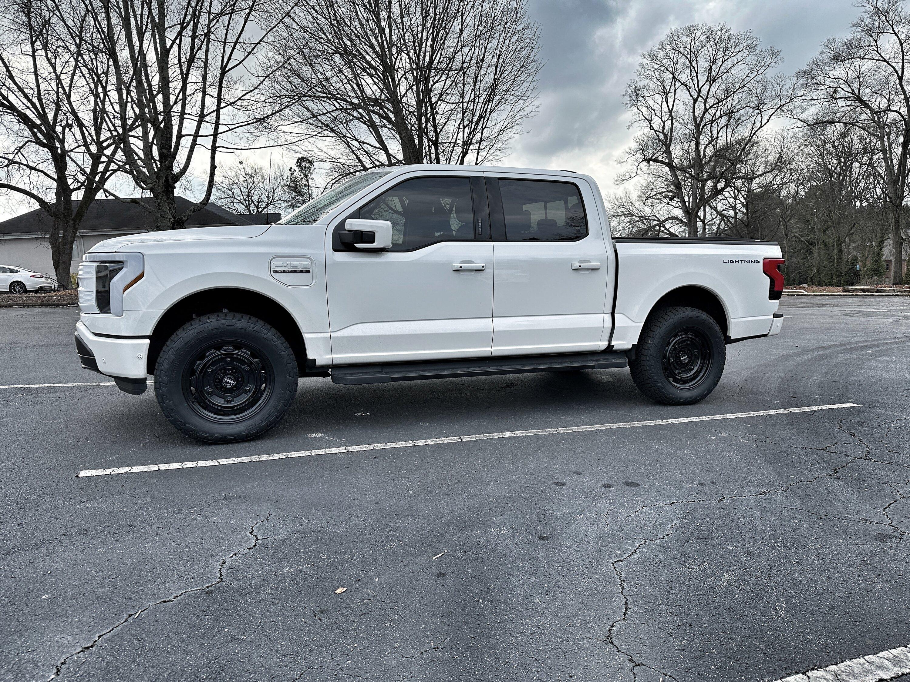 Ford F-150 Lightning Just a little bigger: 2" Readylift Lift Kit, 20" Brink Barracks wheels, Nitto Recon Grappler tires, white grille (Star White Lightning) FC020D71-BE25-433C-87EF-1408E3302DBE