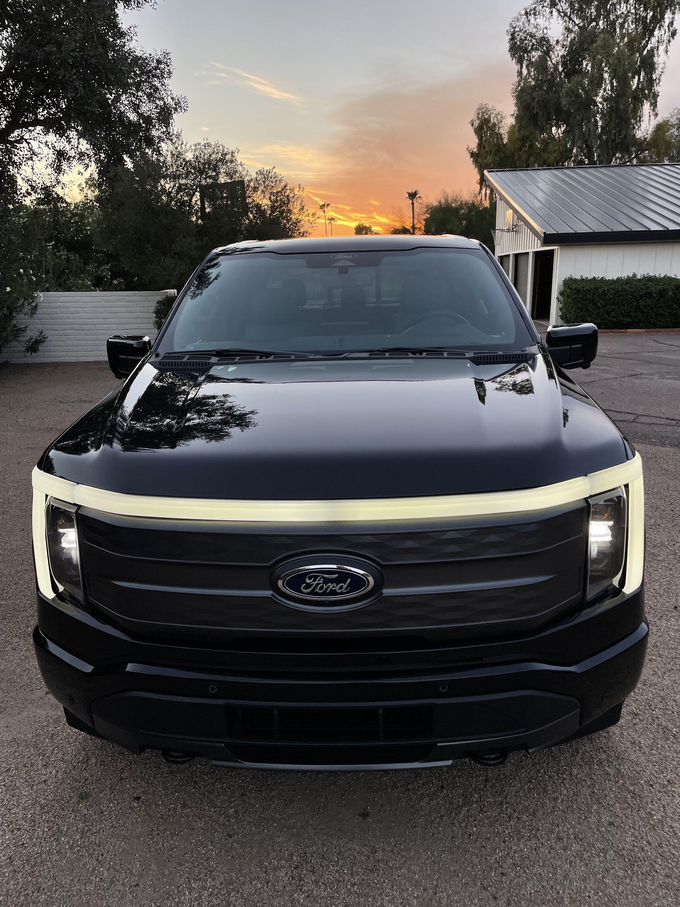 Ford F-150 Lightning 2022 Lariat, ER, loaded front light bar sunset