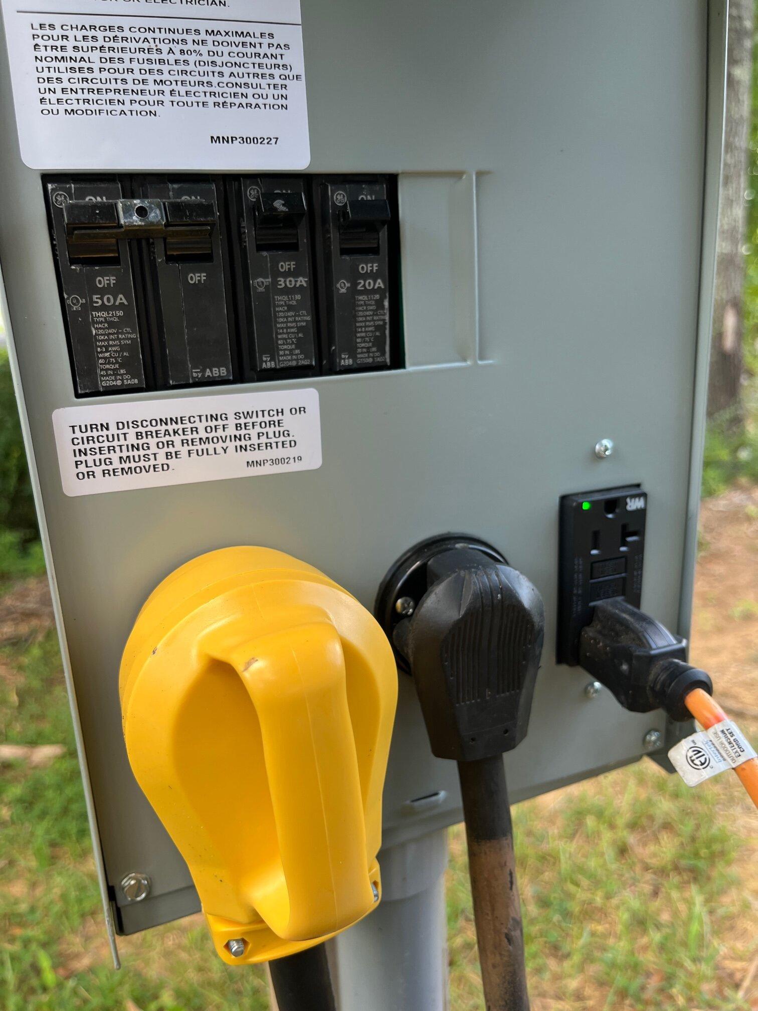 Ford F-150 Lightning Successfully Charging with TWO 30amp 120v outlets, for 240v power, at a campground... FULL HOOKUP at Campground.JPG