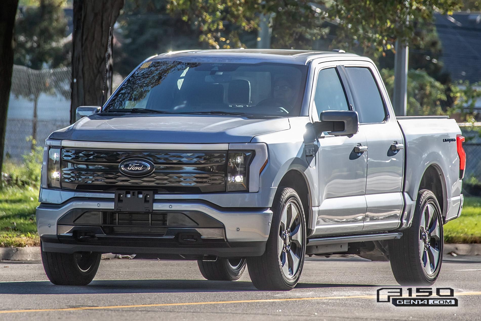 Ford F-150 Lightning F-150 Lightning Platinum (Iconic Silver) & Lariat (Rapid Red) Spotted On Public Roads Iced Blue Silver 2022 F150 Lightning Platinum EV Truck Spotted 1