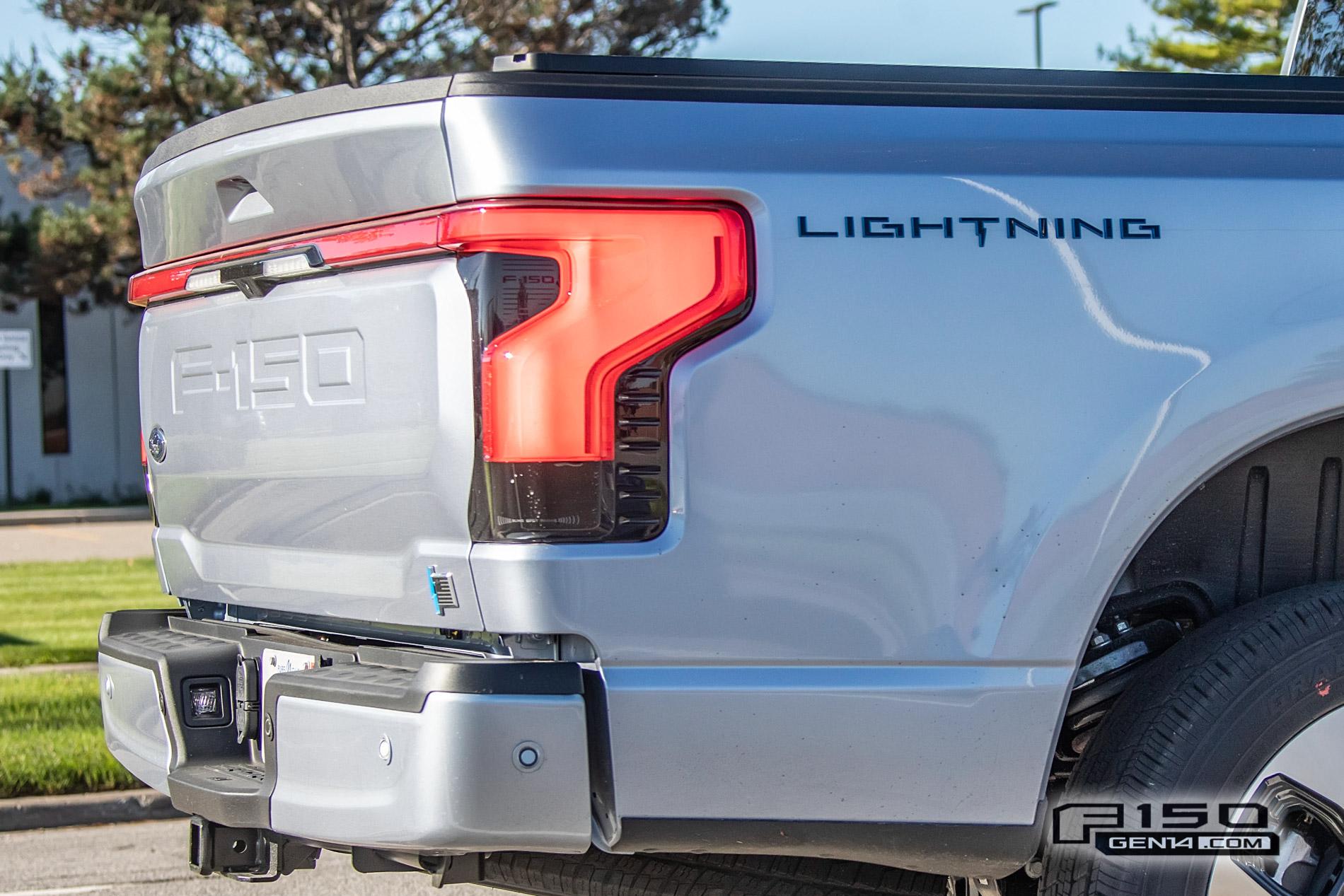 Ford F-150 Lightning F-150 Lightning Platinum (Iconic Silver) & Lariat (Rapid Red) Spotted On Public Roads Iced Blue Silver 2022 F150 Lightning Platinum EV Truck Spotted 11