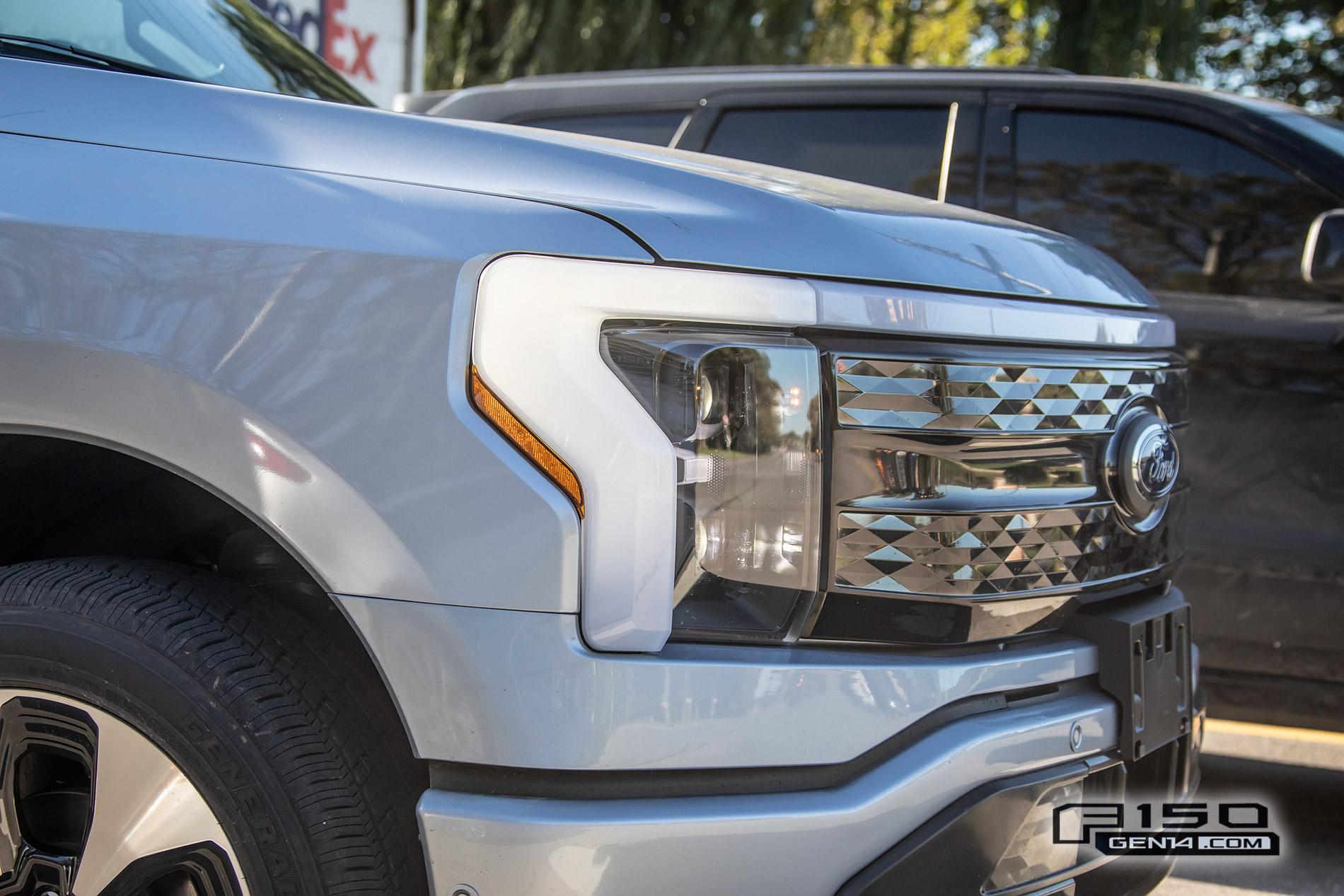 Ford F-150 Lightning F-150 Lightning Platinum (Iconic Silver) & Lariat (Rapid Red) Spotted On Public Roads Iced Blue Silver 2022 F150 Lightning Platinum EV Truck Spotted 16