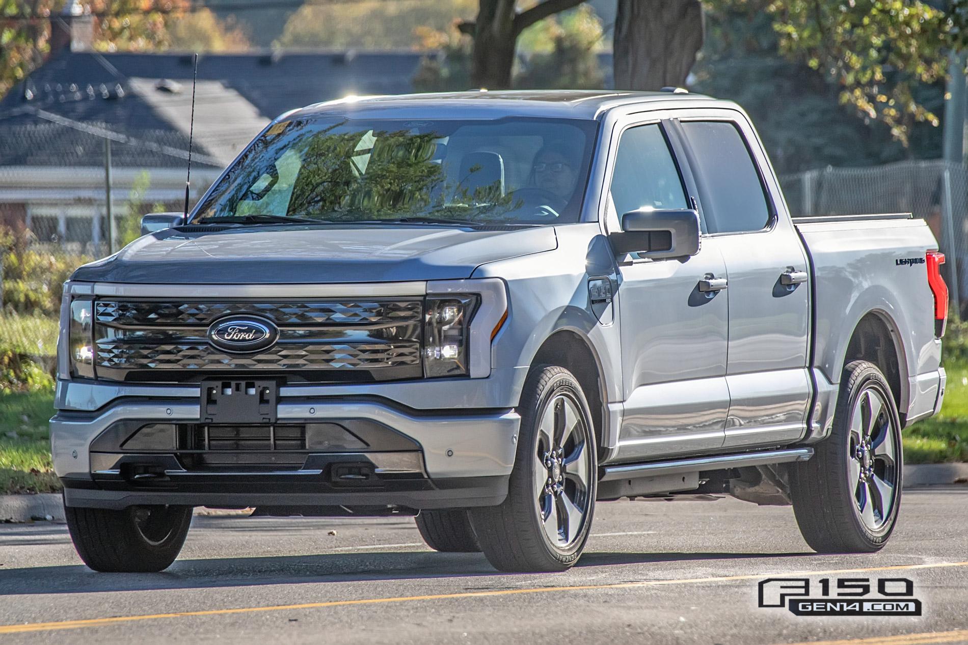 Ford F-150 Lightning F-150 Lightning Platinum (Iconic Silver) & Lariat (Rapid Red) Spotted On Public Roads Iced Blue Silver 2022 F150 Lightning Platinum EV Truck Spotted 2