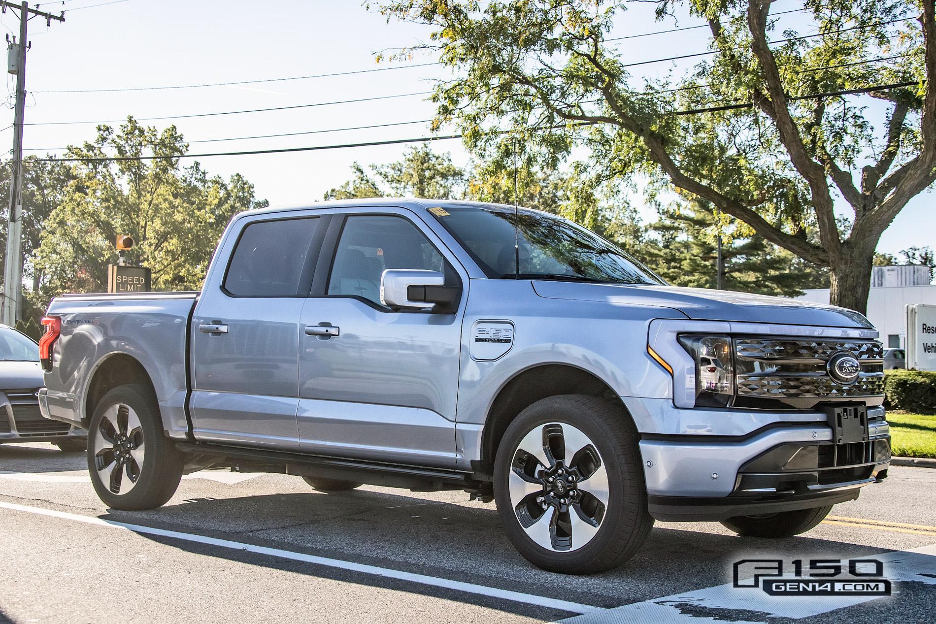 Ford F-150 Lightning F-150 Lightning Platinum (Iconic Silver) & Lariat (Rapid Red) Spotted On Public Roads Iced Blue Silver 2022 F150 Lightning Platinum EV Truck Spotted 4