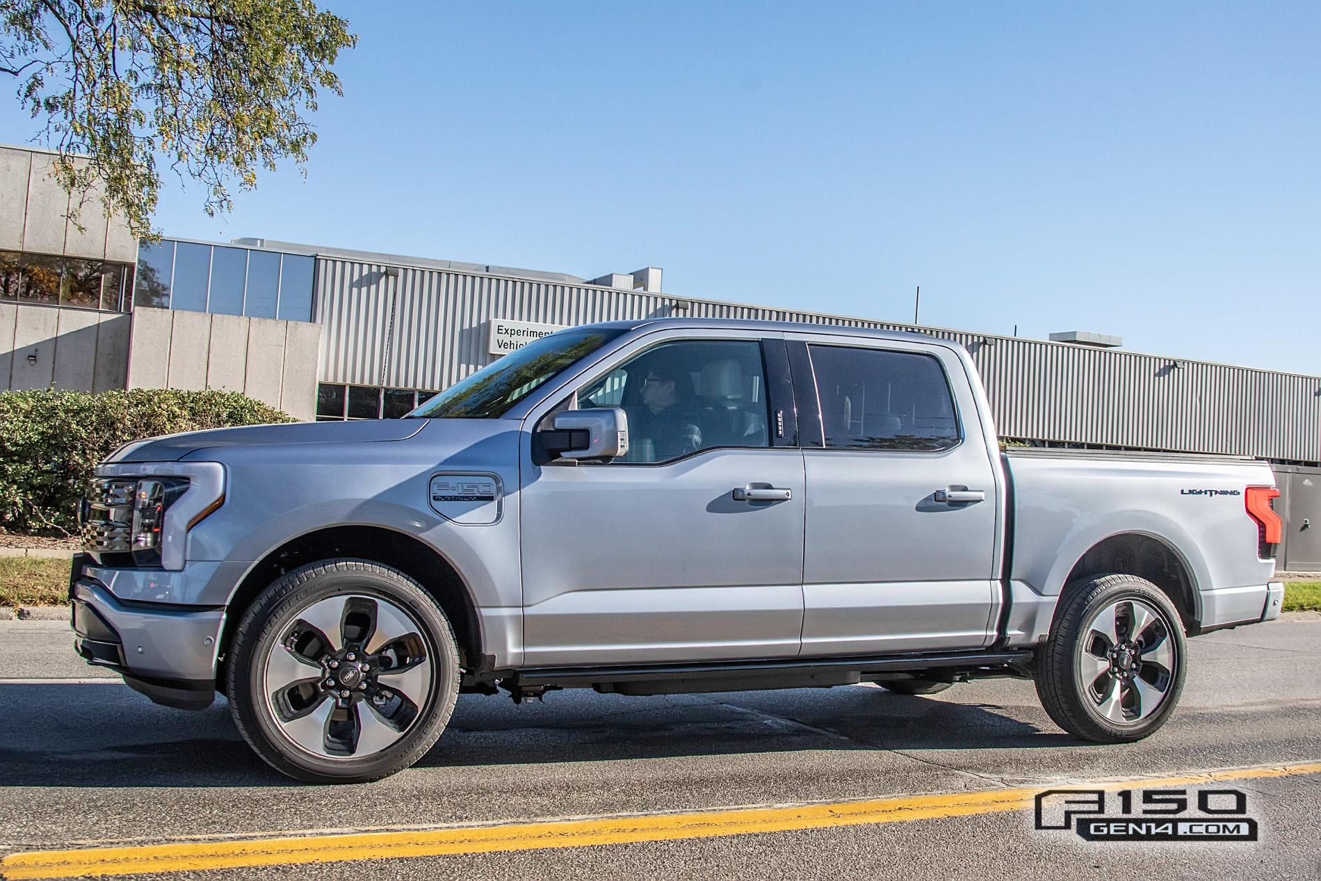 Ford F-150 Lightning F-150 Lightning Platinum (Iconic Silver) & Lariat (Rapid Red) Spotted On Public Roads Iced Blue Silver 2022 F150 Lightning Platinum EV Truck Spotted 5