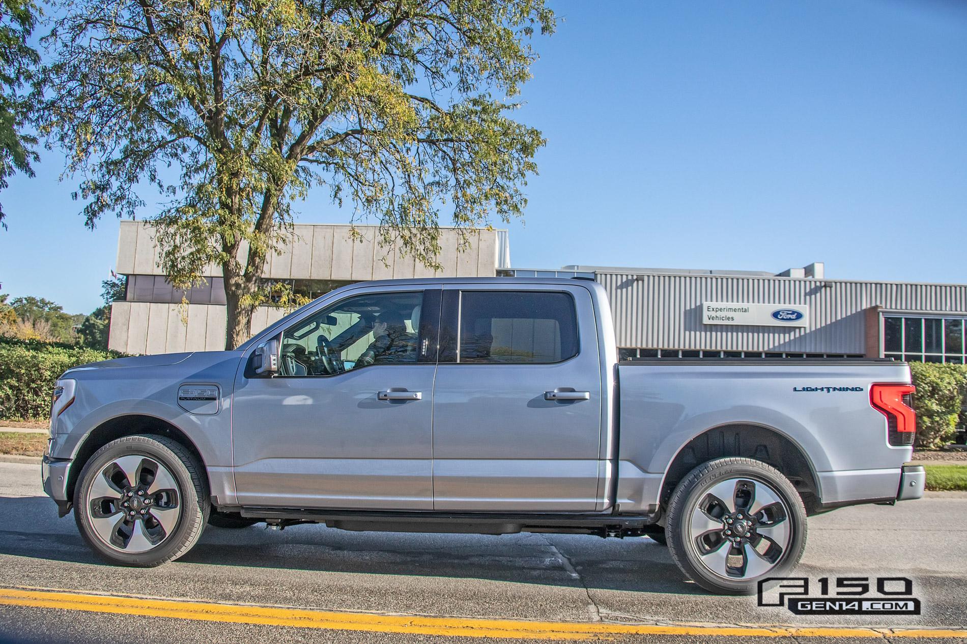 Ford F-150 Lightning F-150 Lightning Platinum (Iconic Silver) & Lariat (Rapid Red) Spotted On Public Roads Iced Blue Silver 2022 F150 Lightning Platinum EV Truck Spotted 6