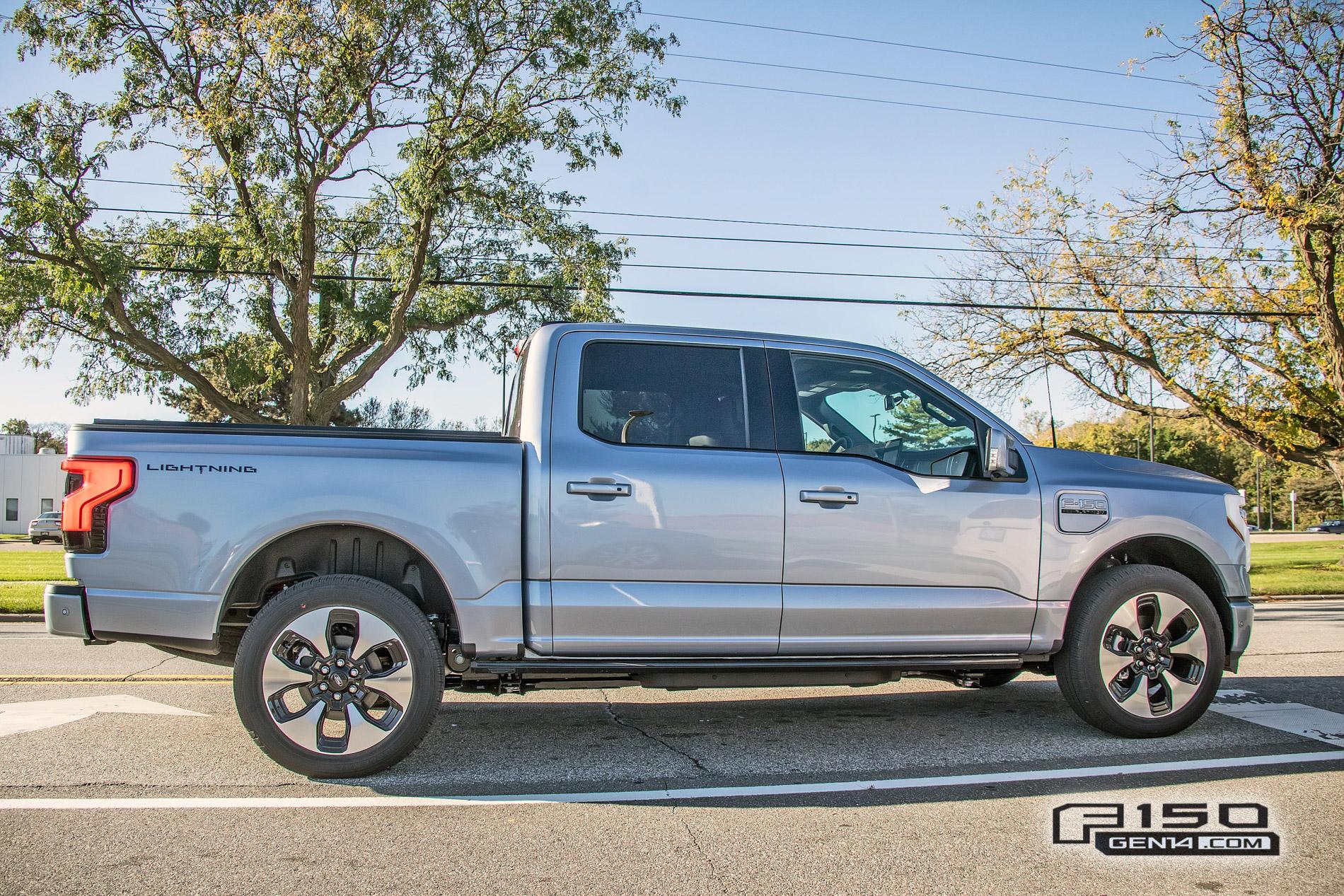 Ford F-150 Lightning F-150 Lightning Platinum (Iconic Silver) & Lariat (Rapid Red) Spotted On Public Roads Iced Blue Silver 2022 F150 Lightning Platinum EV Truck Spotted 7