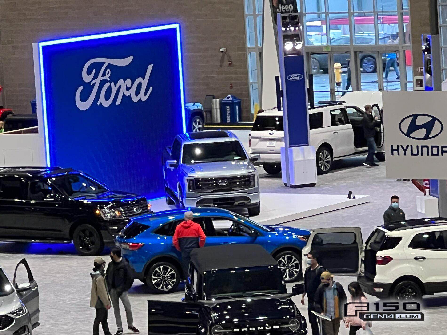 Ford F-150 Lightning F-150 Lightning (in Iced Blue Silver) at Seattle Auto Show Iced Blue Silver F-150 Lightning Platinum EV Pickup Truck 13