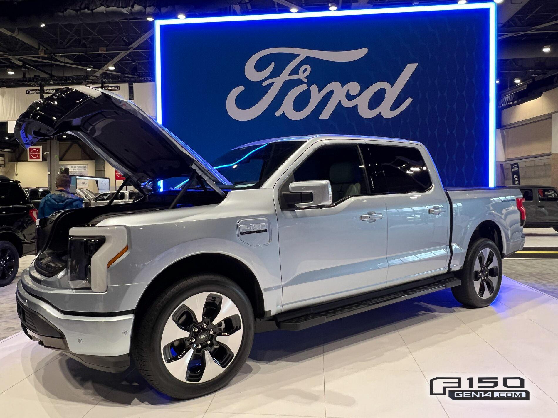 Ford F-150 Lightning F-150 Lightning (in Iced Blue Silver) at Seattle Auto Show Iced Blue Silver F-150 Lightning Platinum EV Pickup Truck 14