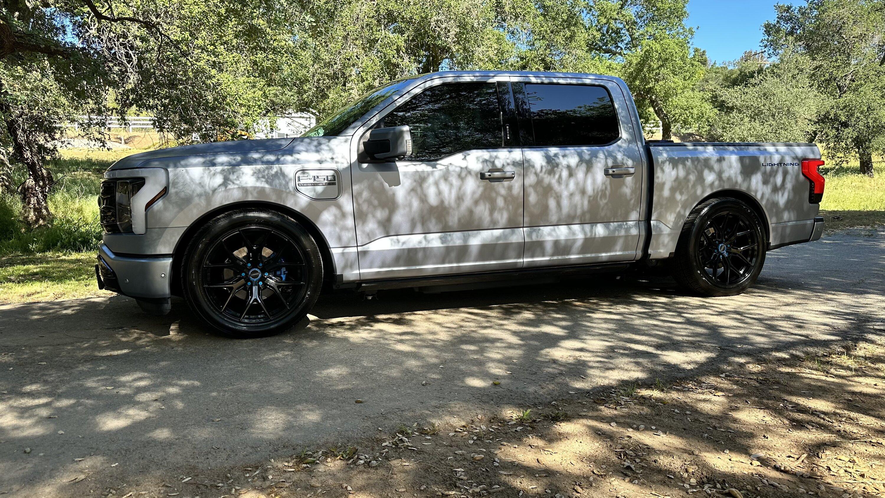 Ford F-150 Lightning Iced Blue Silver Lightning Build. Mods: PPF matte finish, Line-X, gloss black painted grille, black wrapped roof, wheels IMG_0278