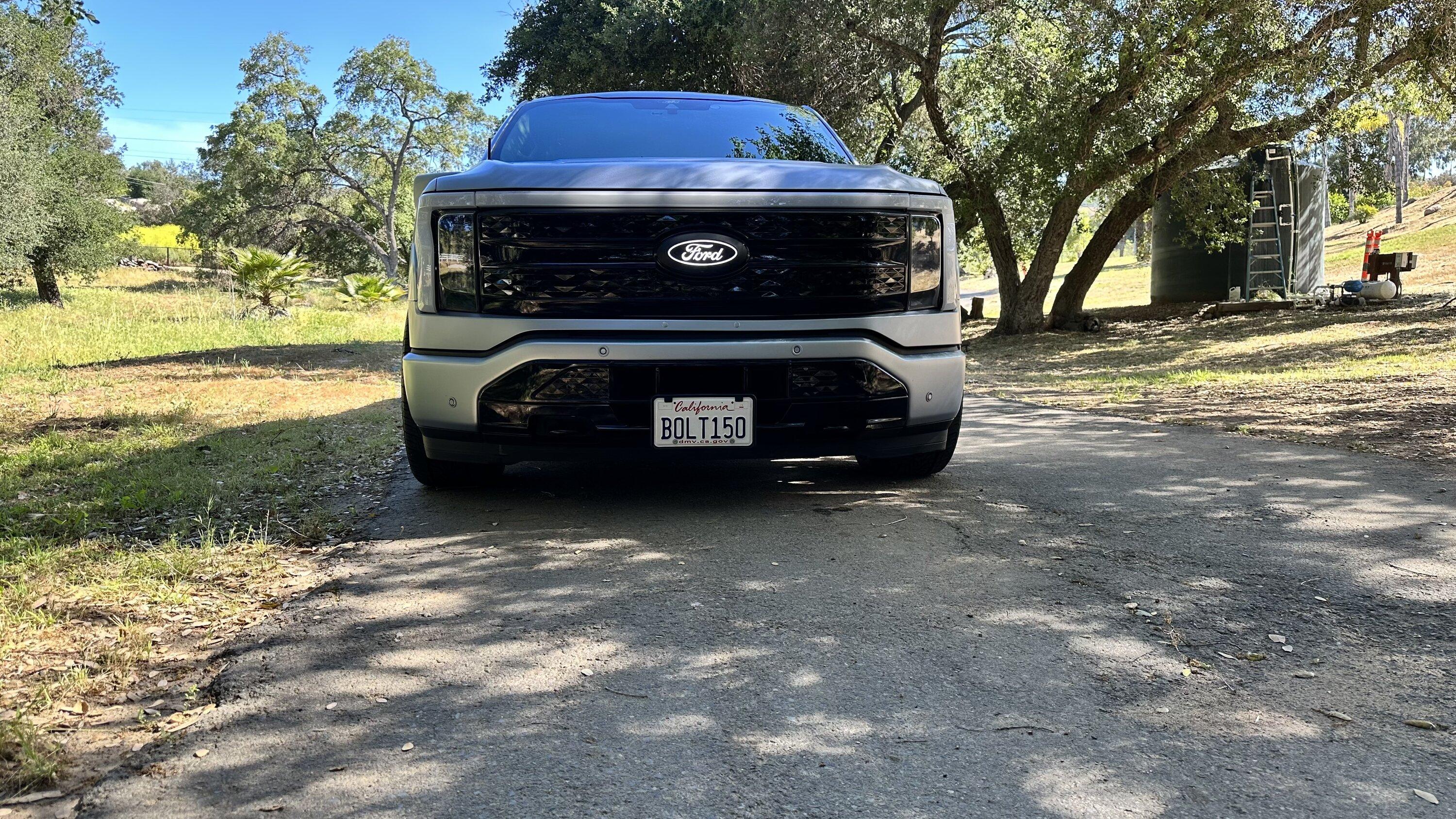 Ford F-150 Lightning Iced Blue Silver Lightning Build. Mods: PPF matte finish, Line-X, gloss black painted grille, black wrapped roof, wheels IMG_0279