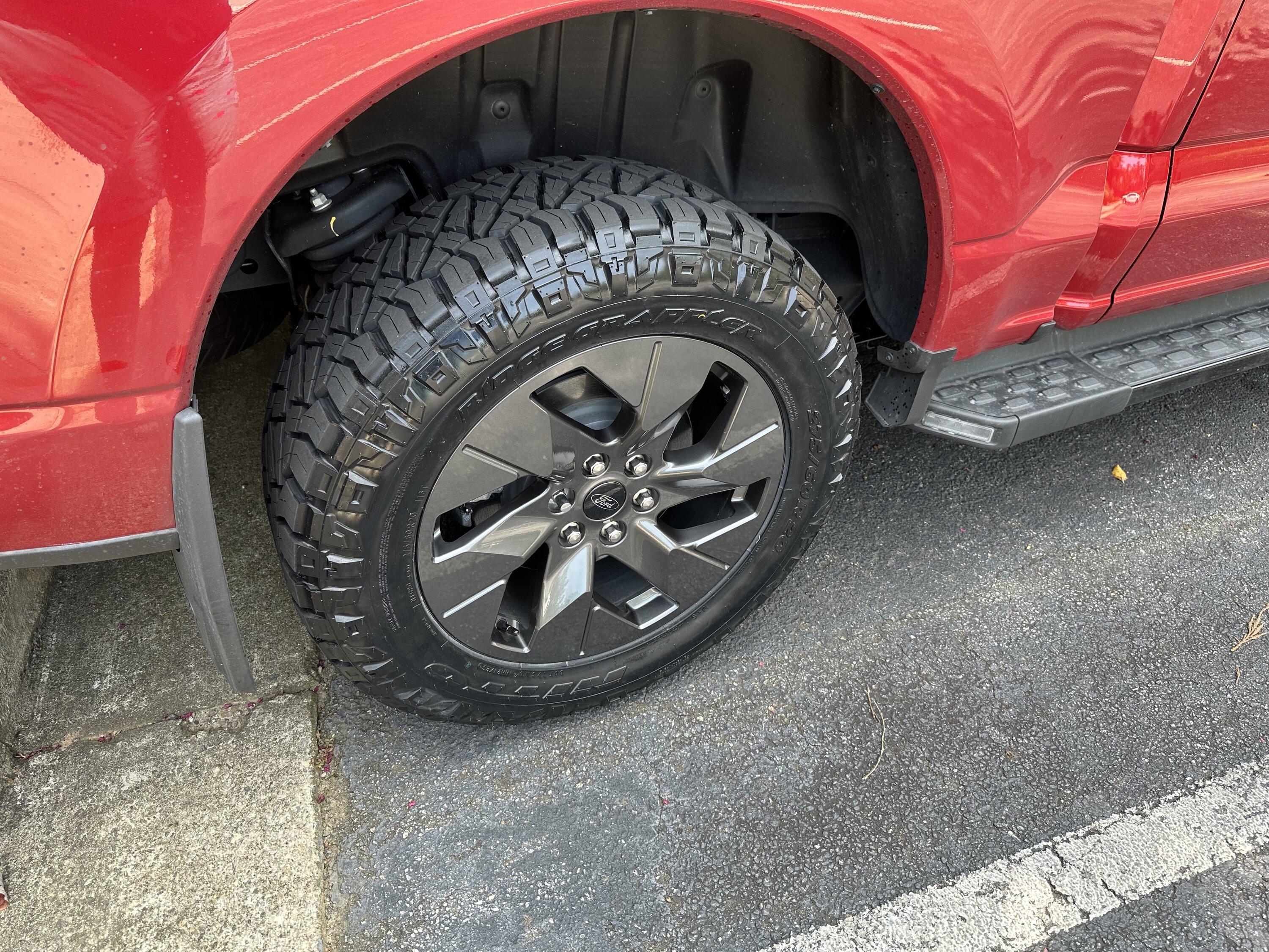 Ford F-150 Lightning Lightning Lariat on 20’s, stock size Nitto Ridge Grapplers tires IMG_1107