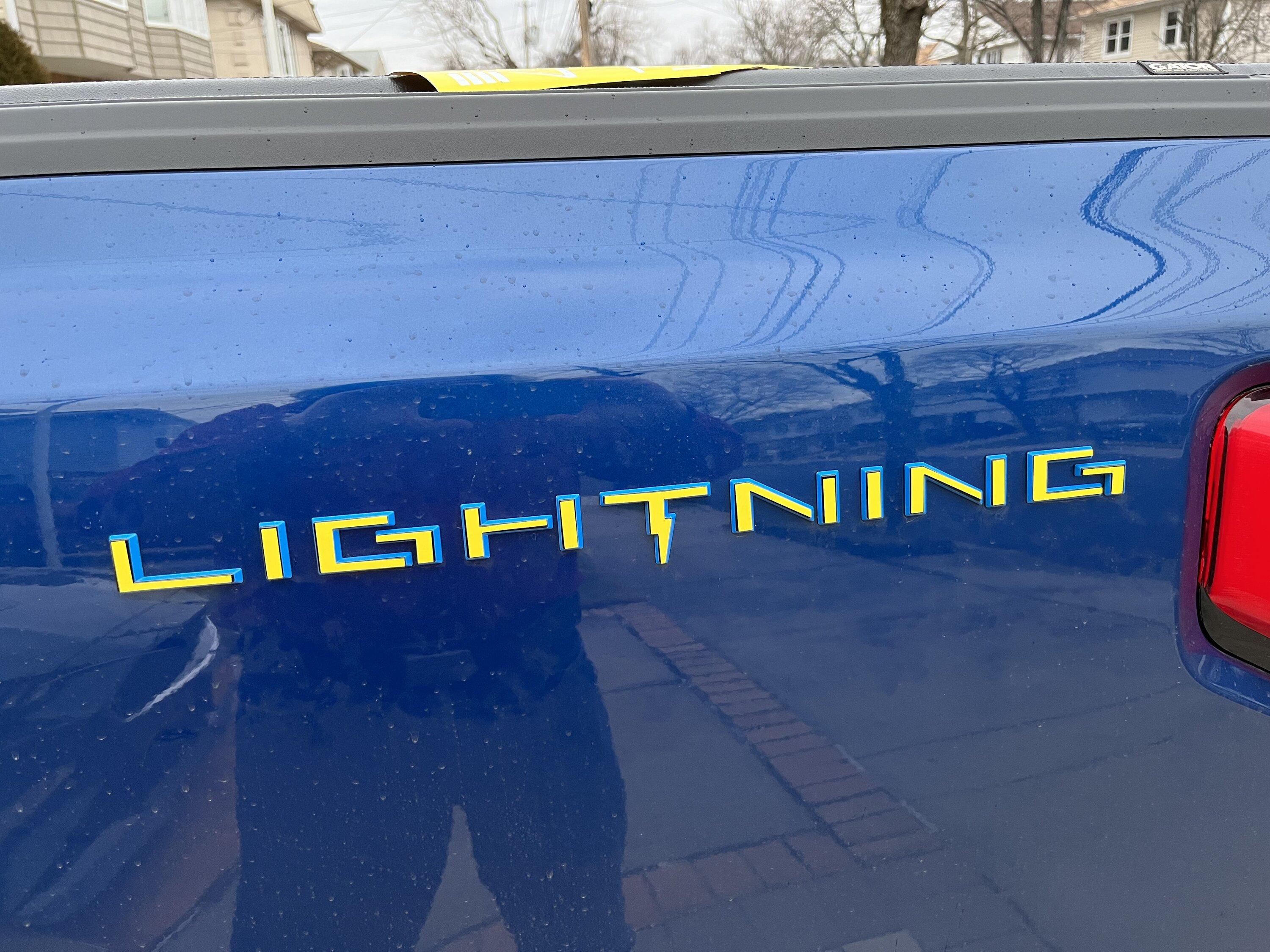 Ford F-150 Lightning My solution to dark badges / lettering on dark colors -- contrasting color vinyl IMG_1332