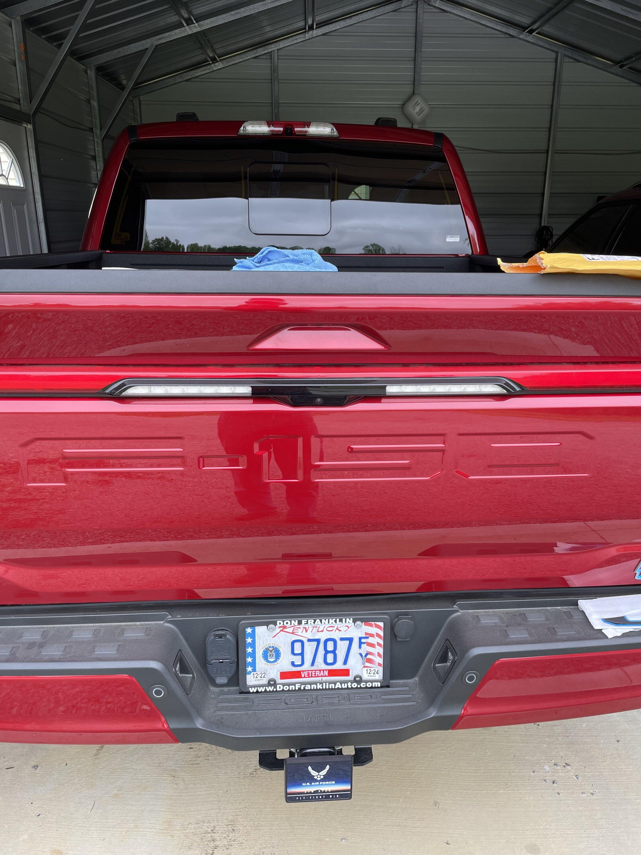 Ford F-150 Lightning Raised reflective letters installed on tailgate and charge door IMG_1652
